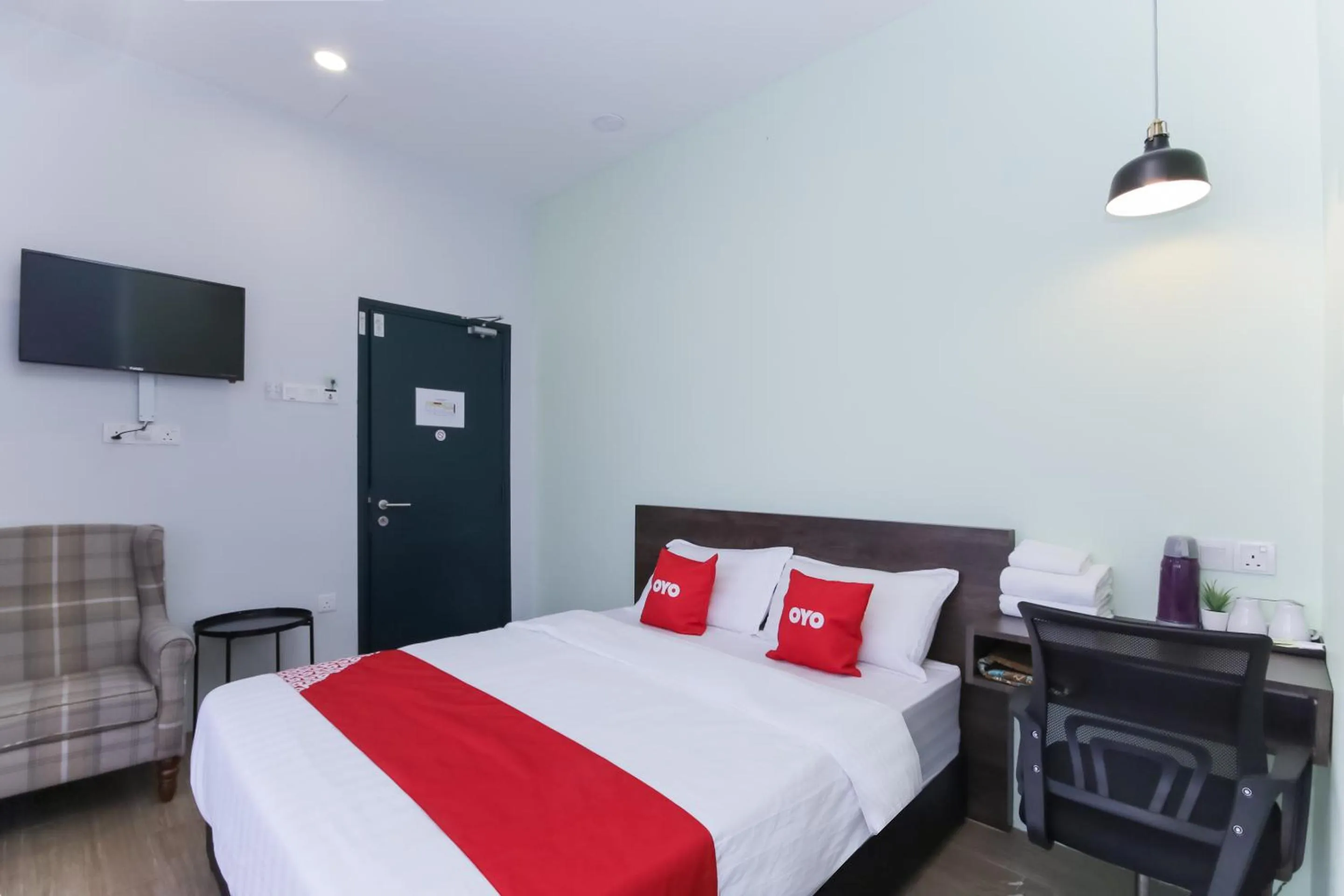 Bedroom in OYO 90399 Green Home Hotel syariah