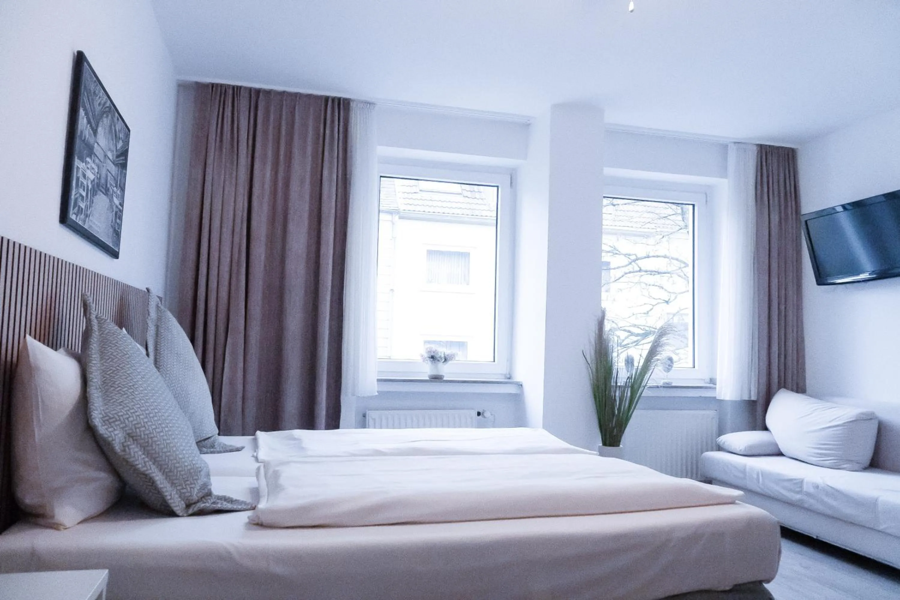 Bed in Stadt-gut-Hotel Rheinischer Hof
