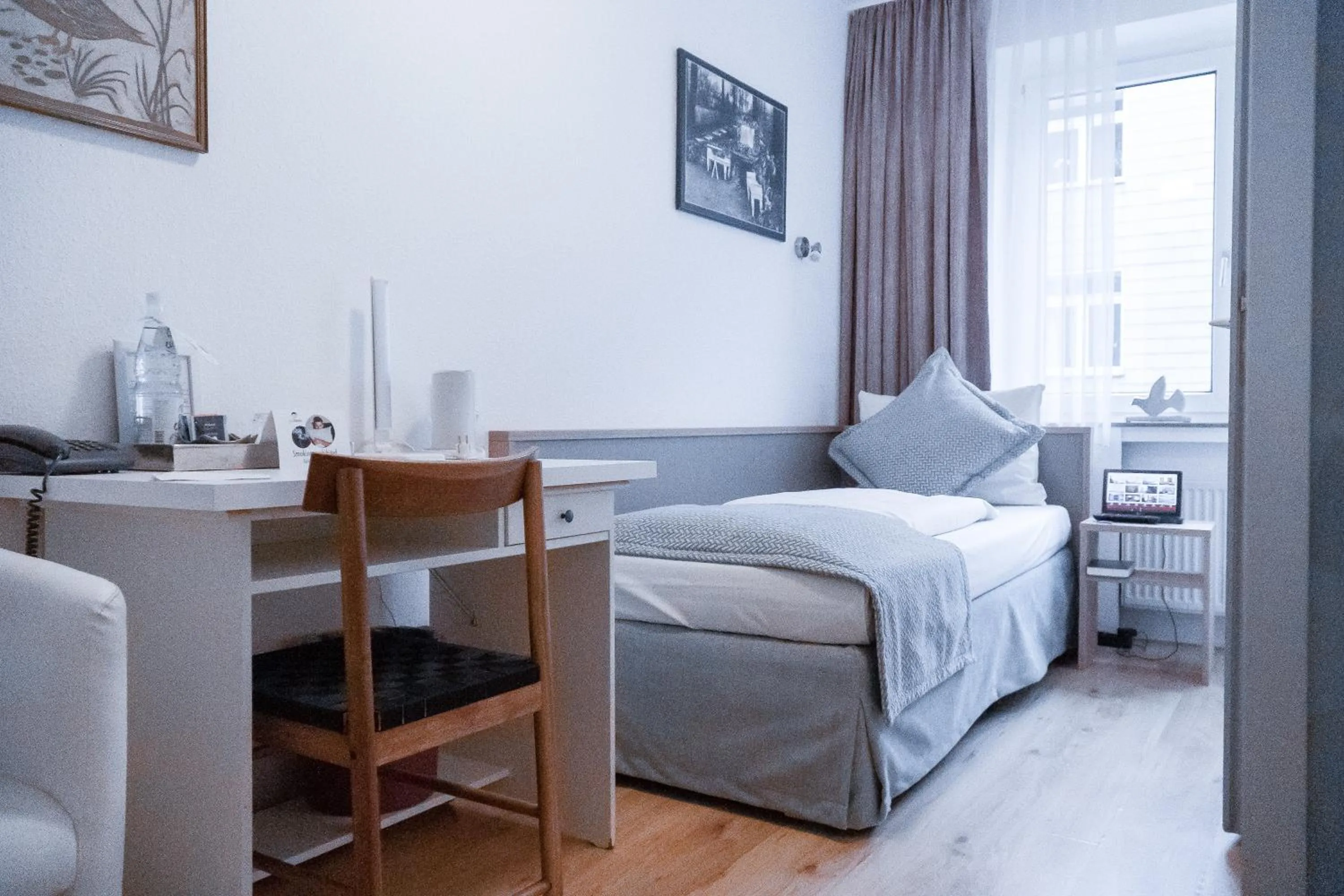 Bed in Stadt-gut-Hotel Rheinischer Hof