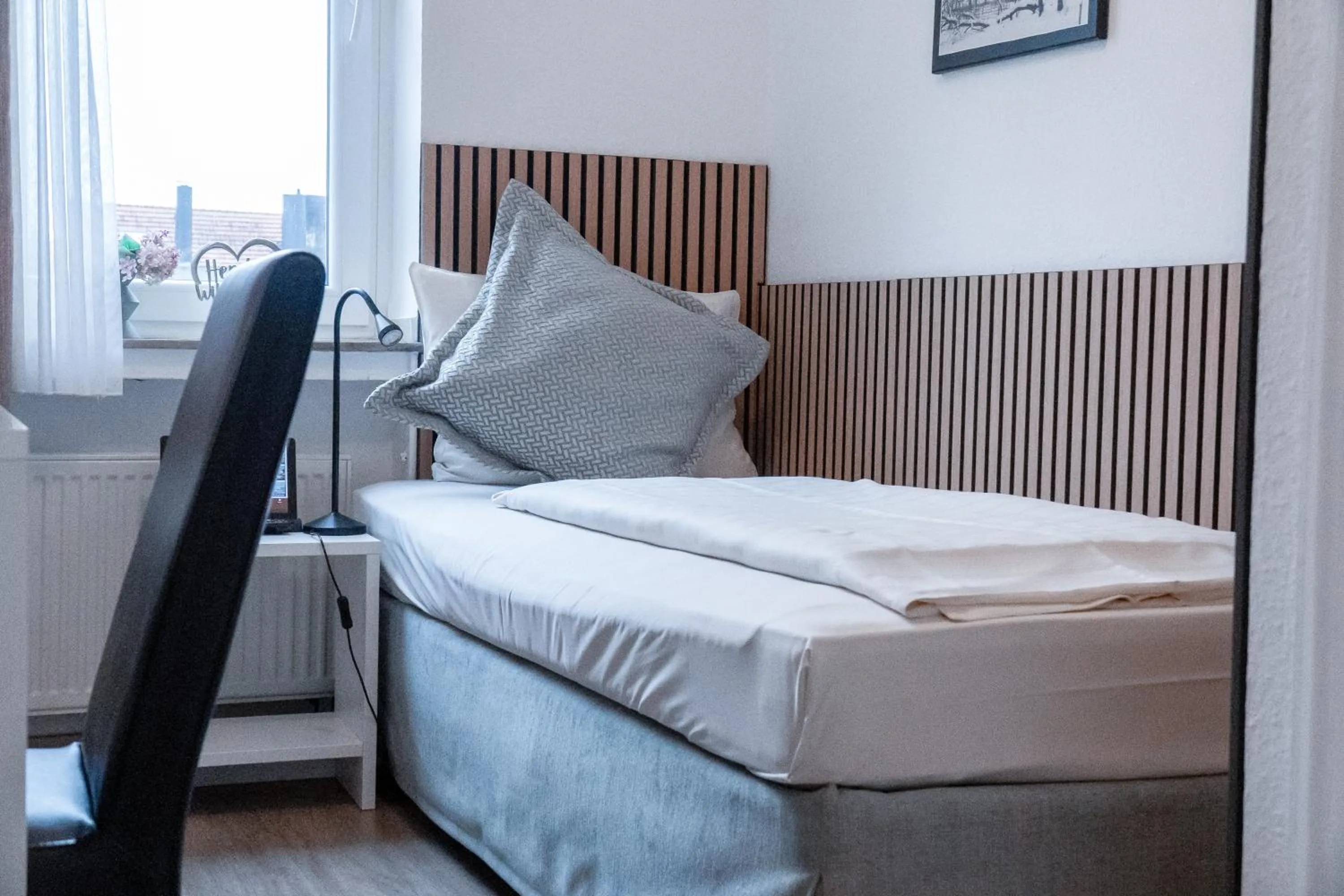 Bed in Stadt-gut-Hotel Rheinischer Hof