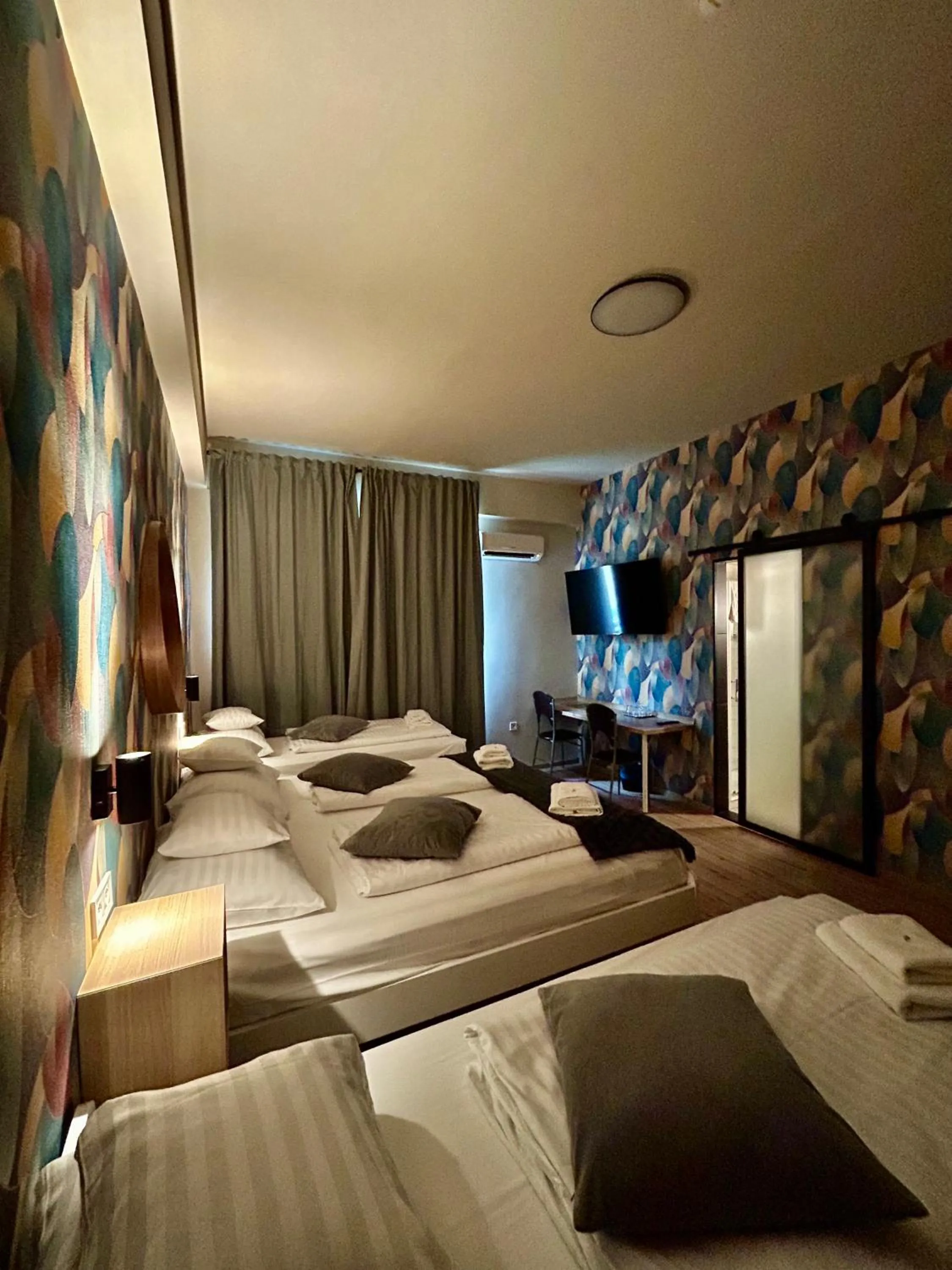 Bed in Boutique Hotel & Event Center