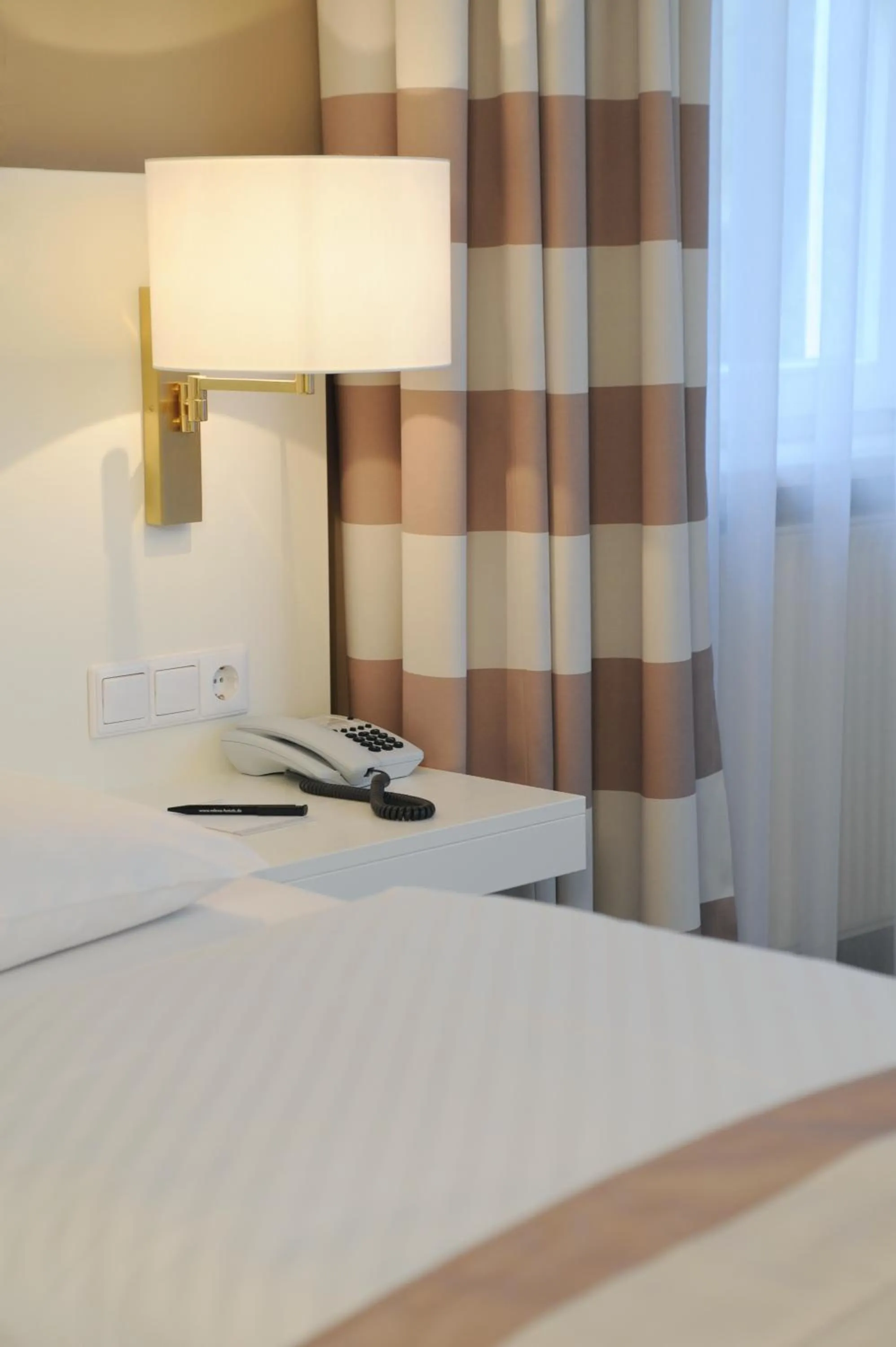 Photo of the whole room, Bed in relexa hotel Schatten Stuttgart