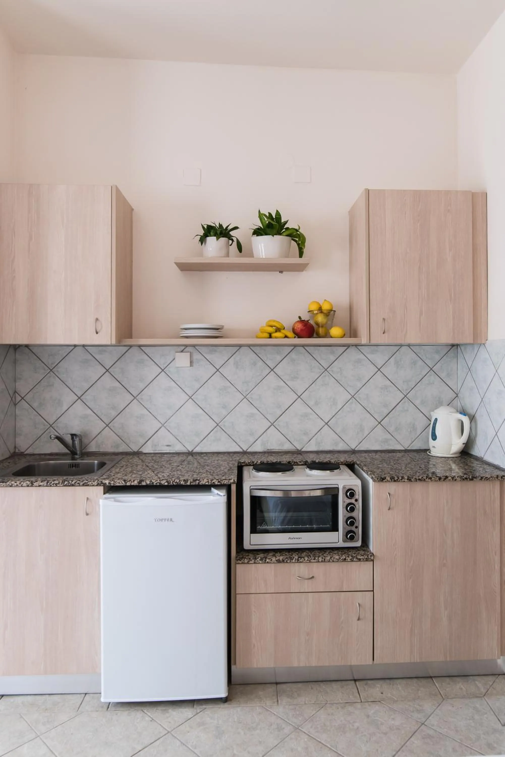 Kitchen or kitchenette in Ilios Malia Hotel Resort