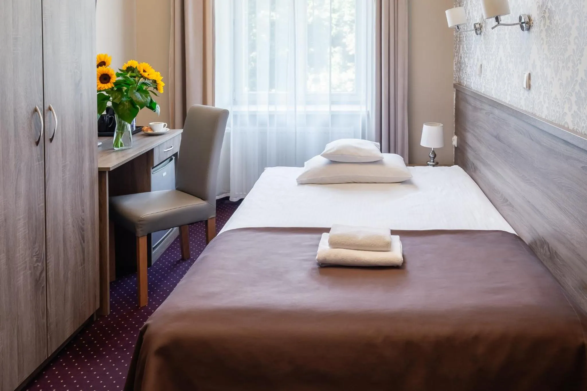 Bed in Hotel Maximum