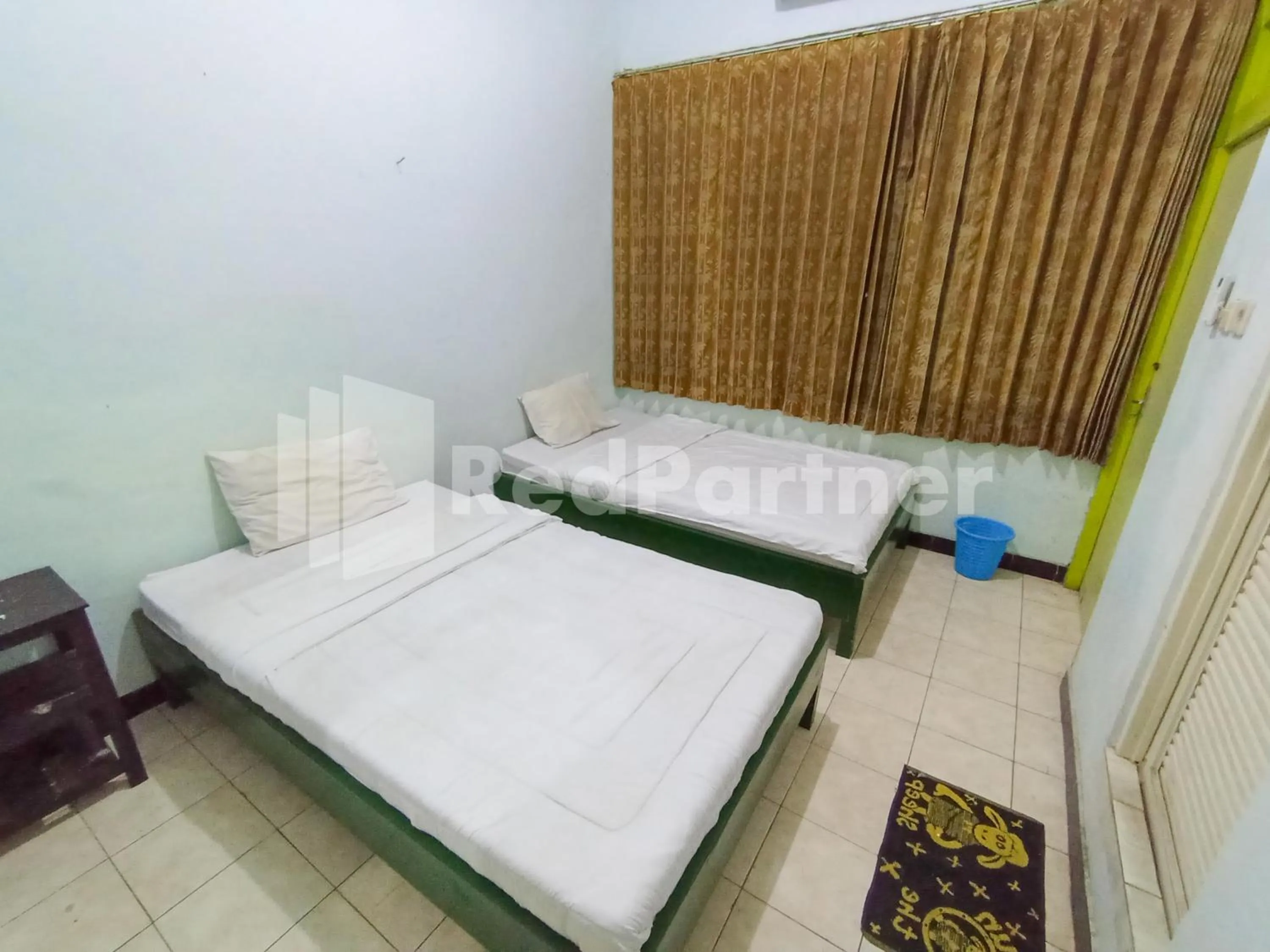 Bedroom, Bed in Orange inn RedPartner Madiun