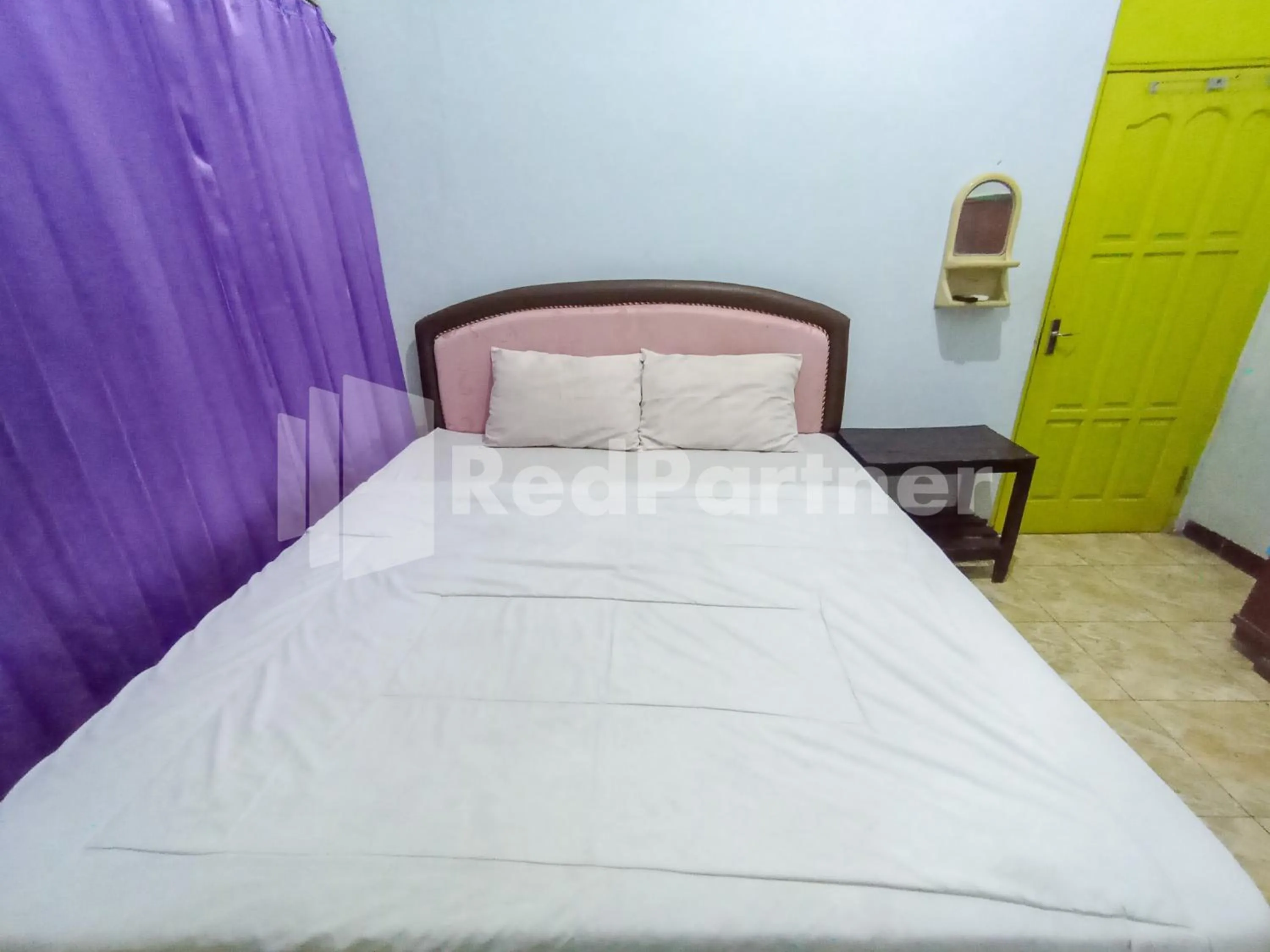 Bedroom, Bed in Orange inn RedPartner Madiun