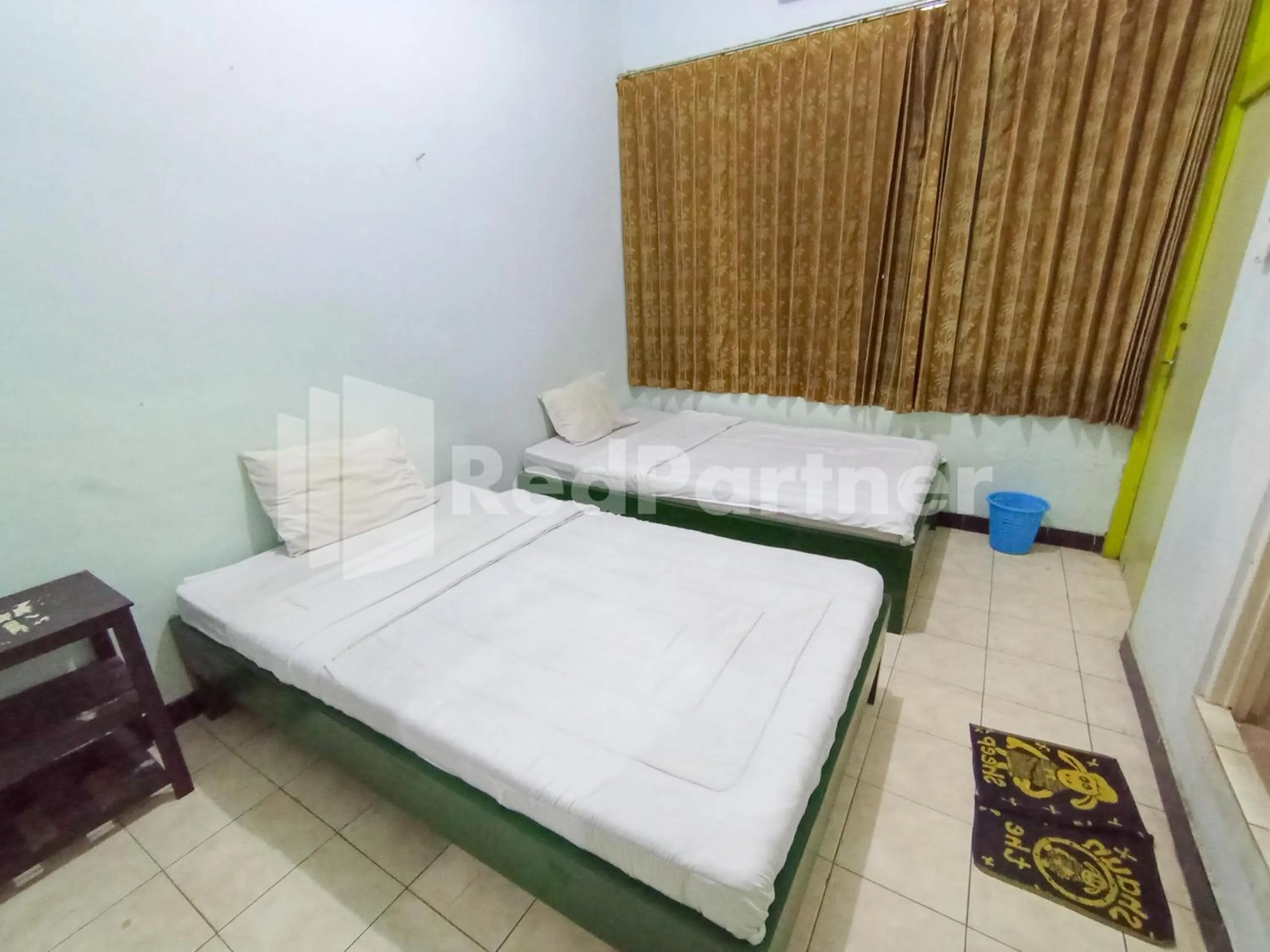 Bedroom, Bed in Orange inn RedPartner Madiun