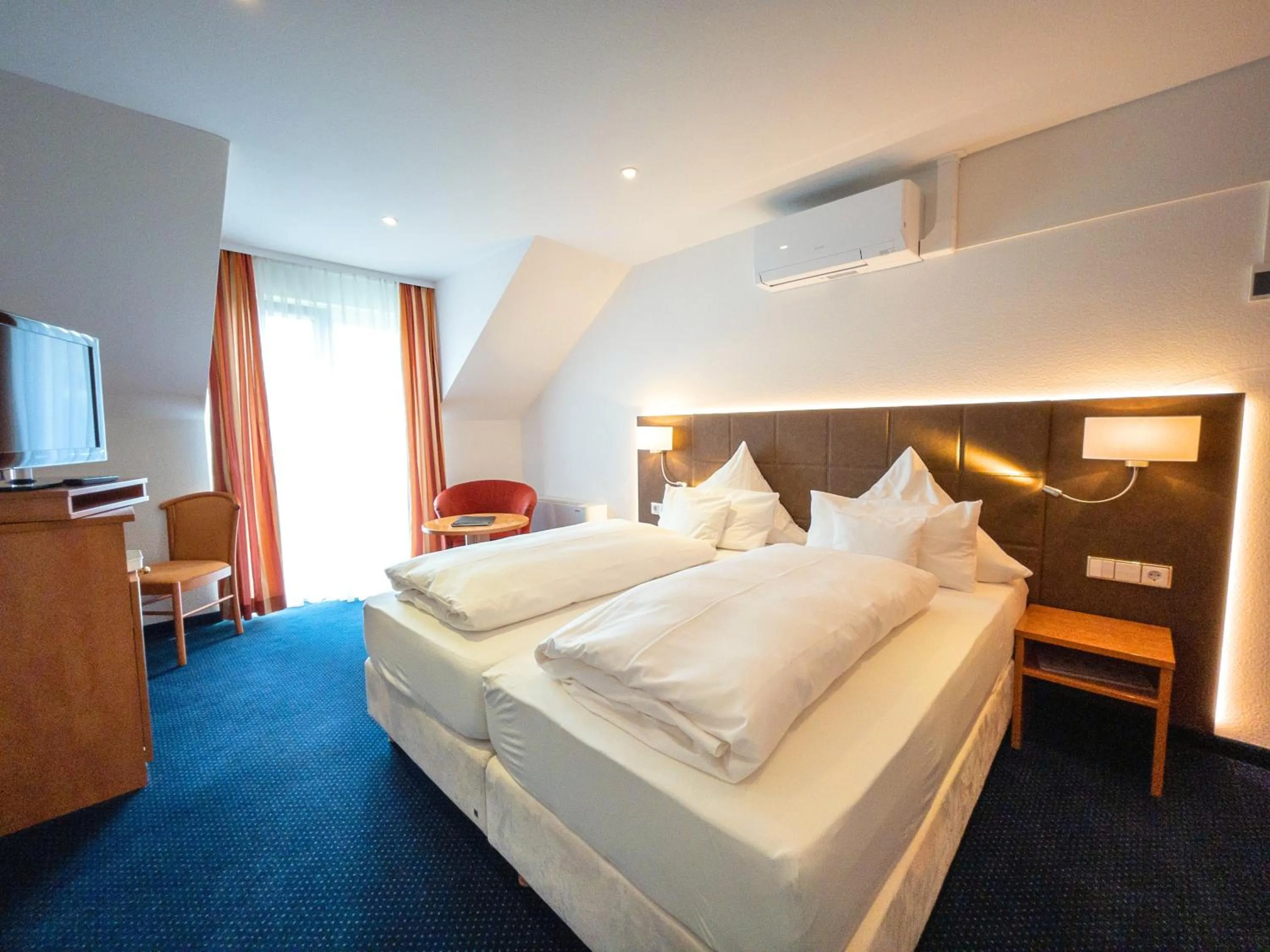 Photo of the whole room, Bed in Atrium Hotel Baden