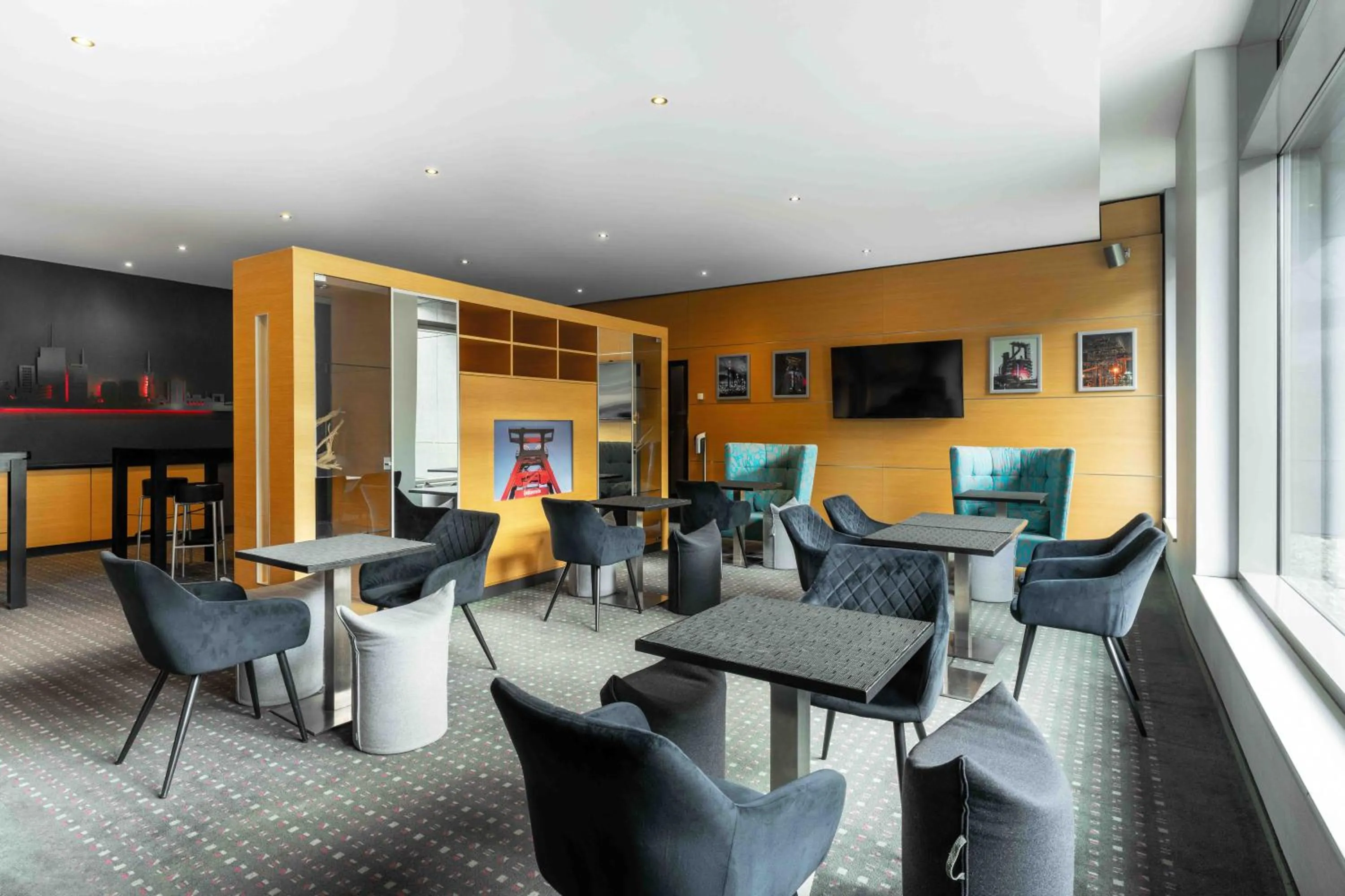 Communal lounge/ TV room in Ramada by Wyndham Essen