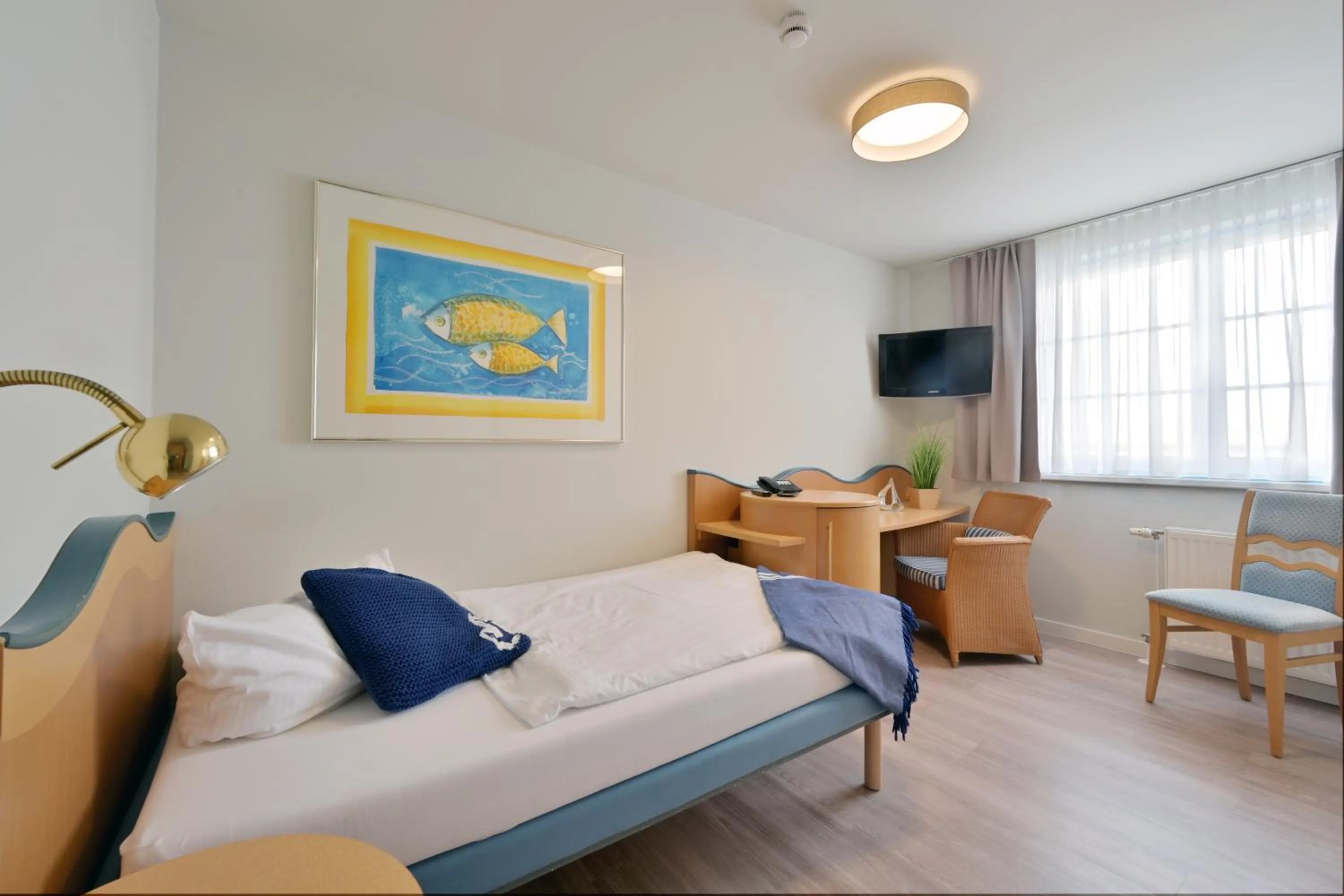 TV and multimedia, Bed in Hotel- & Ferienanlage Kapitäns-Häuser Breege