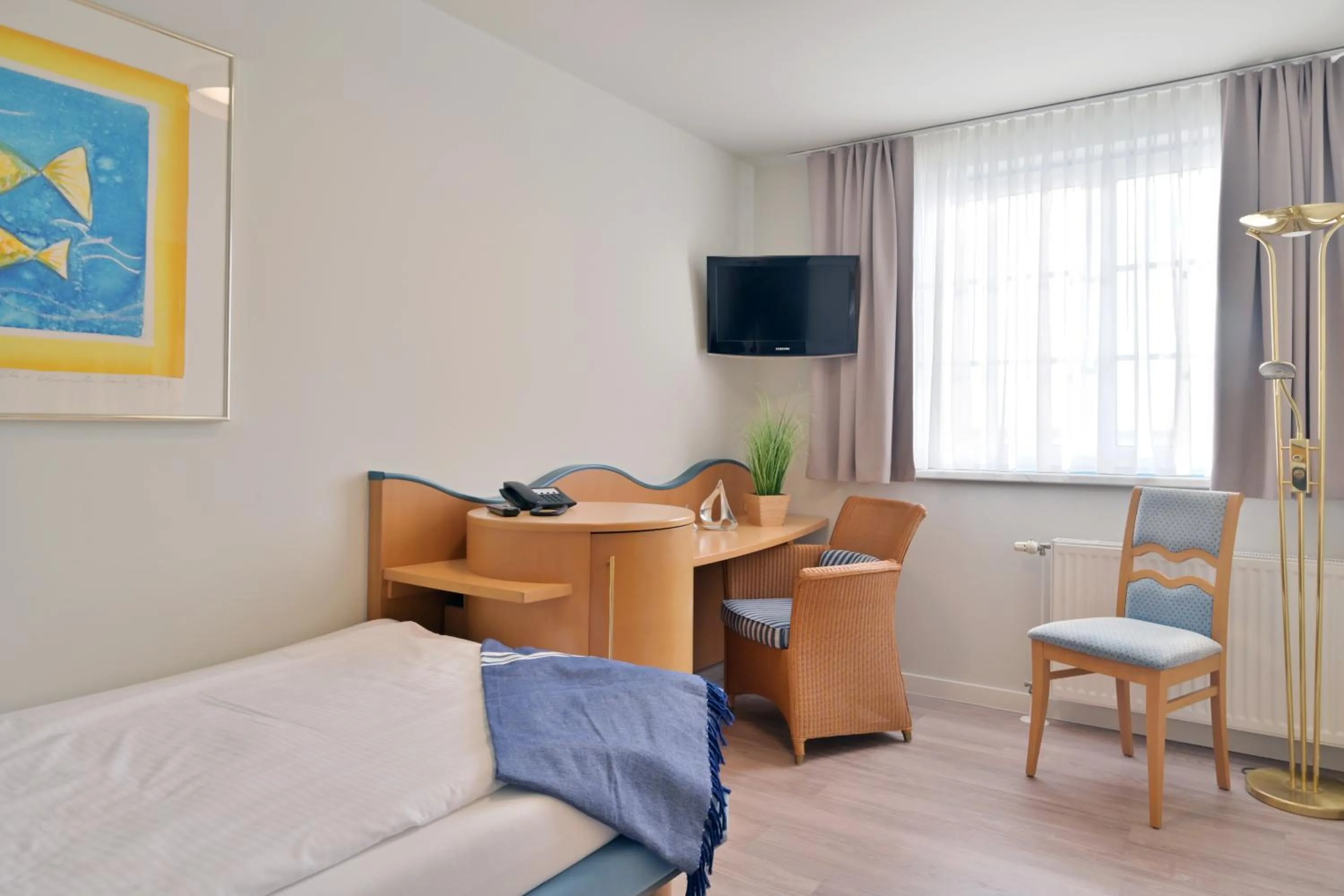 TV and multimedia, Bed in Hotel- & Ferienanlage Kapitäns-Häuser Breege