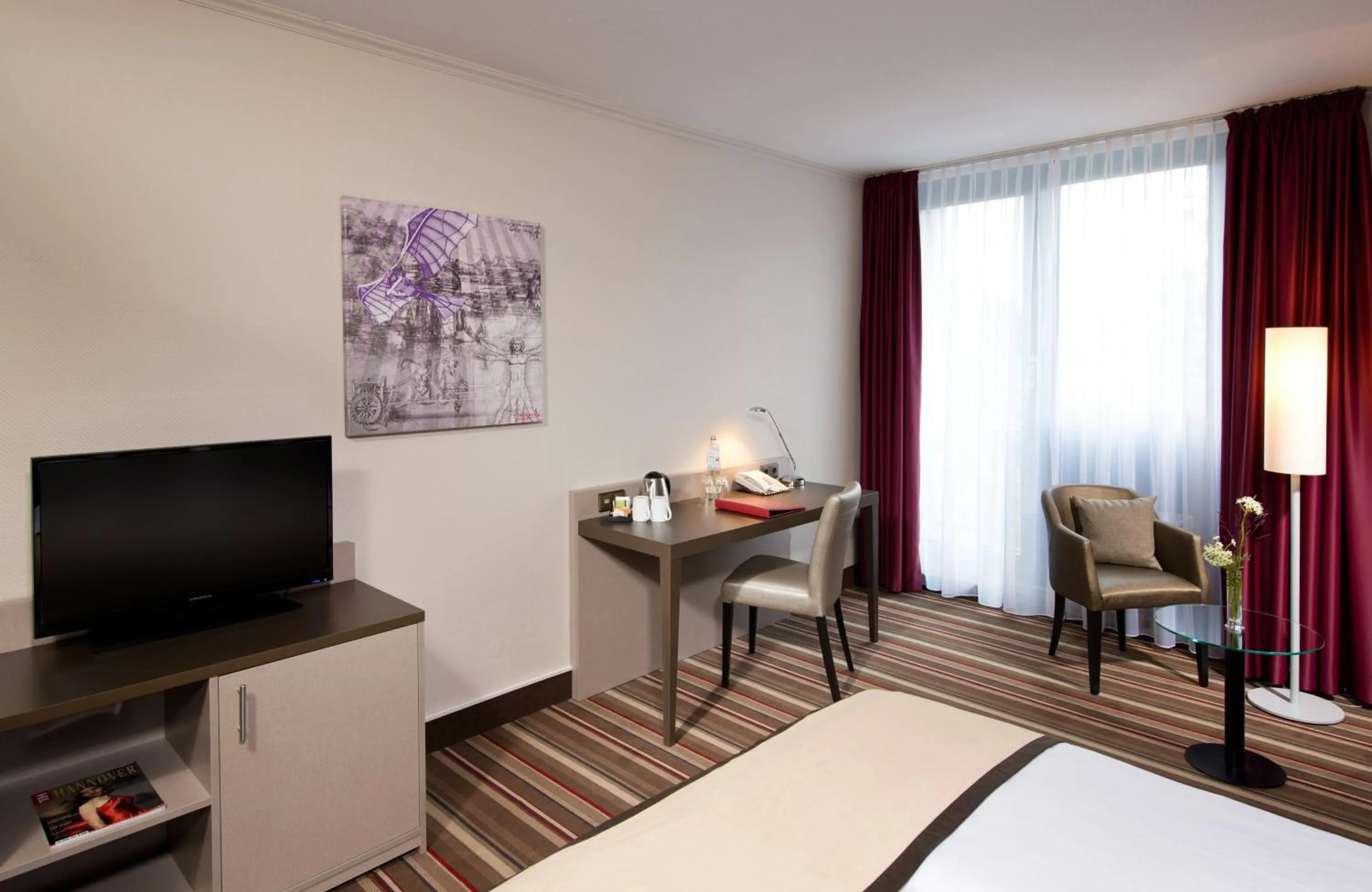 Photo of the whole room, Bed in Leonardo Hotel Hannover Airport