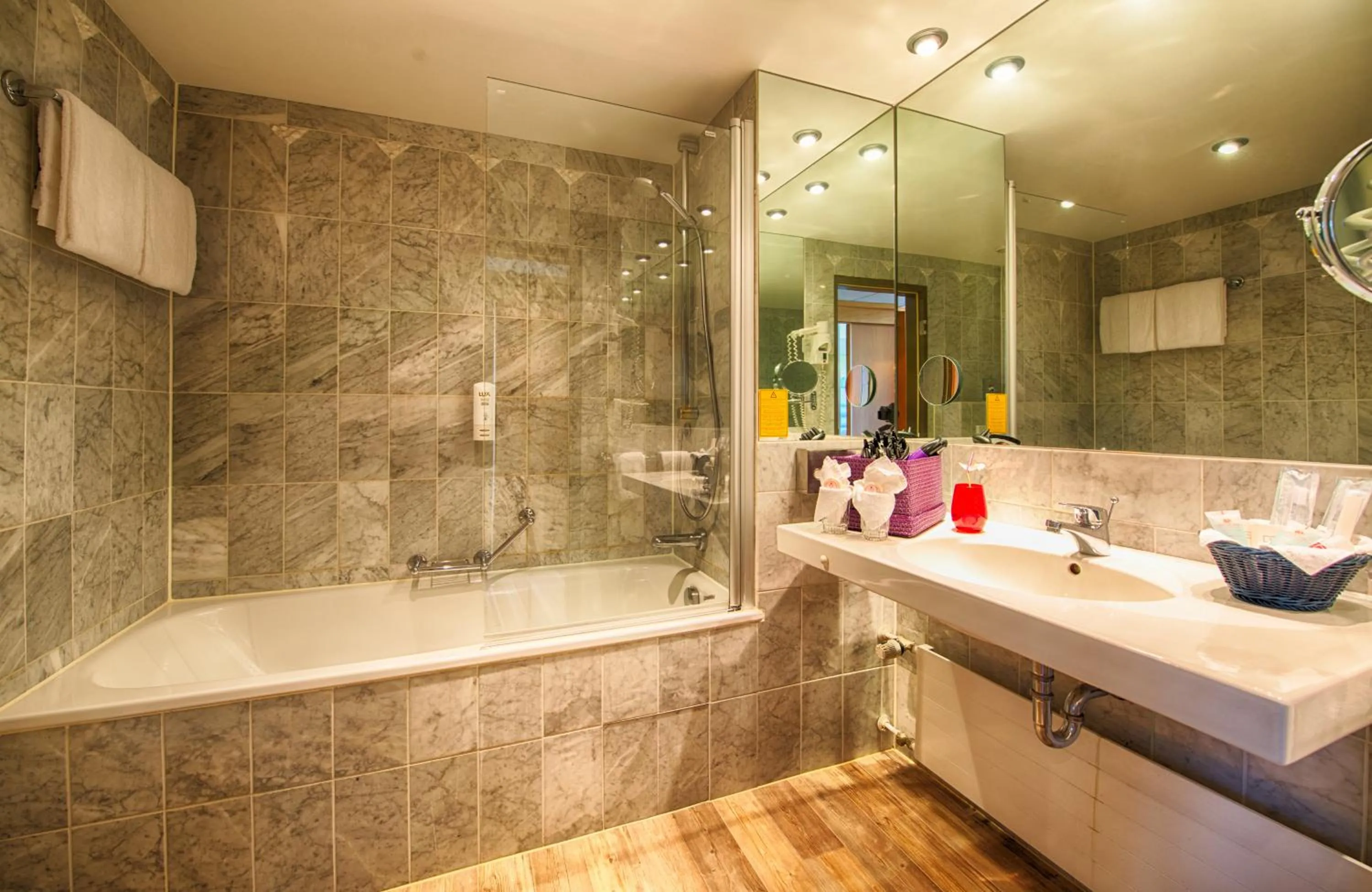 Bathroom in Leonardo Royal Hotel Köln - Am Stadtwald