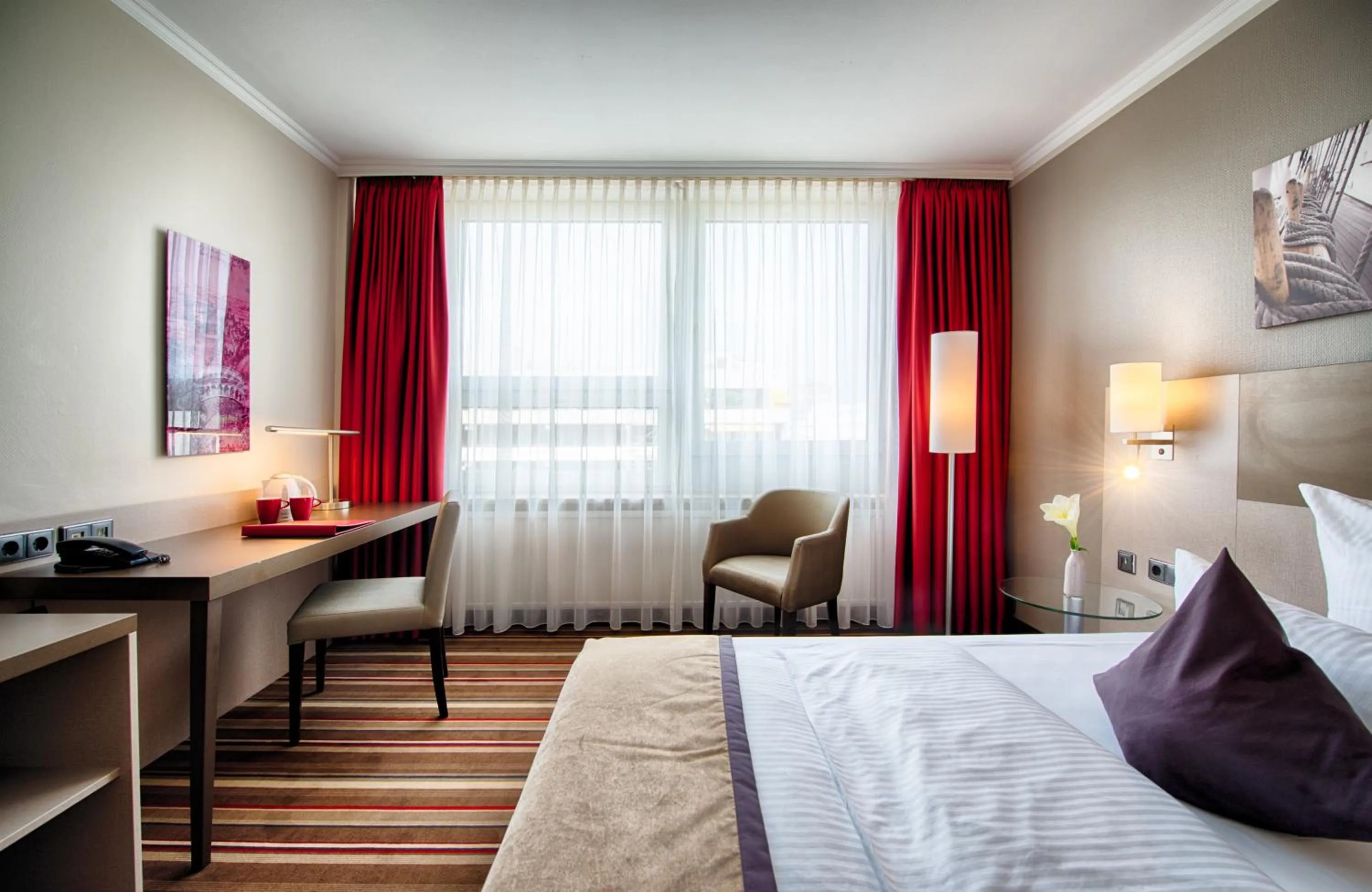 Photo of the whole room, Bed in Leonardo Hotel Hamburg City Nord