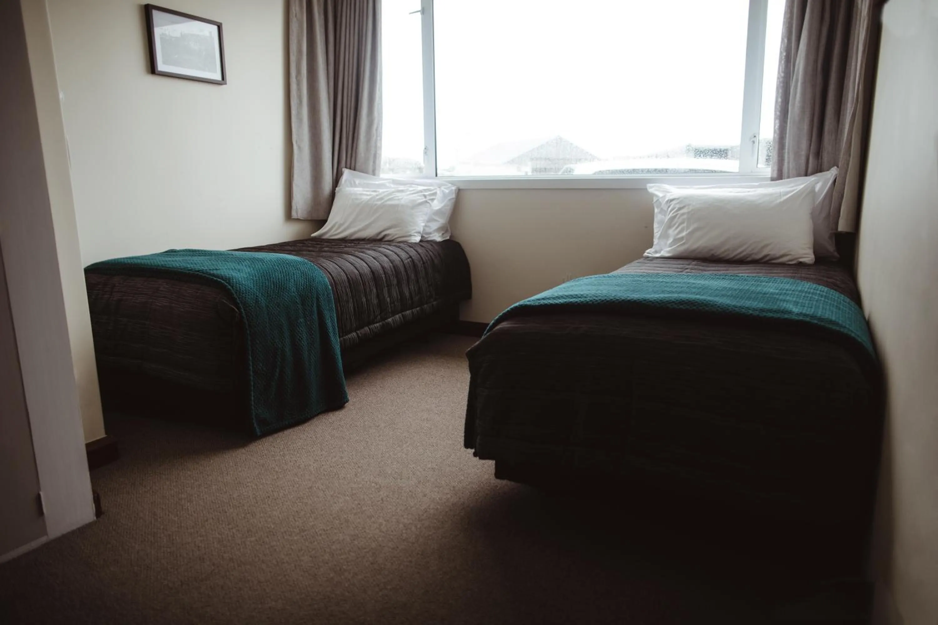 Bed in Makikihi Country Hotel