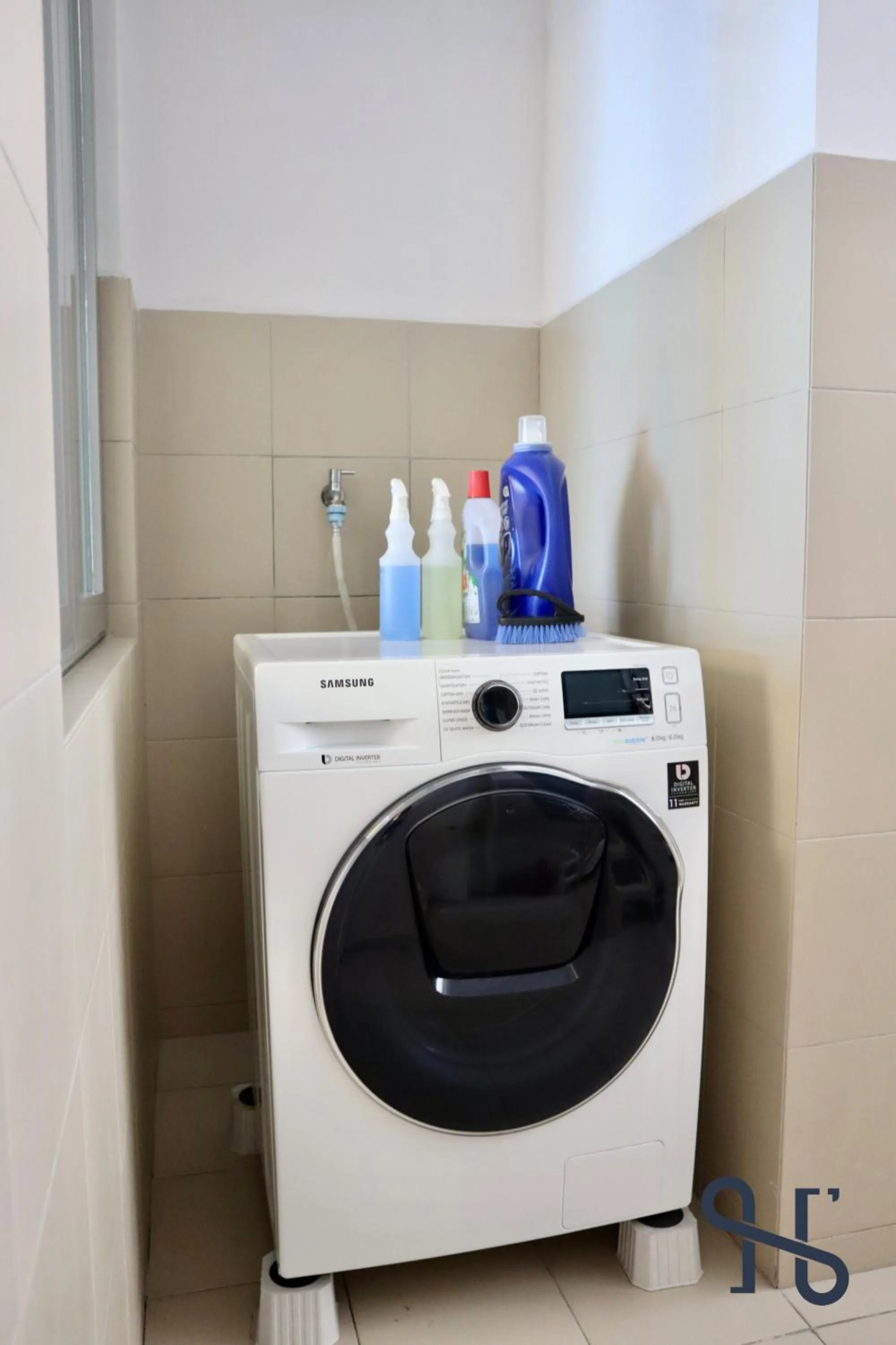 washing machine in Homesuite' Home at The Loft