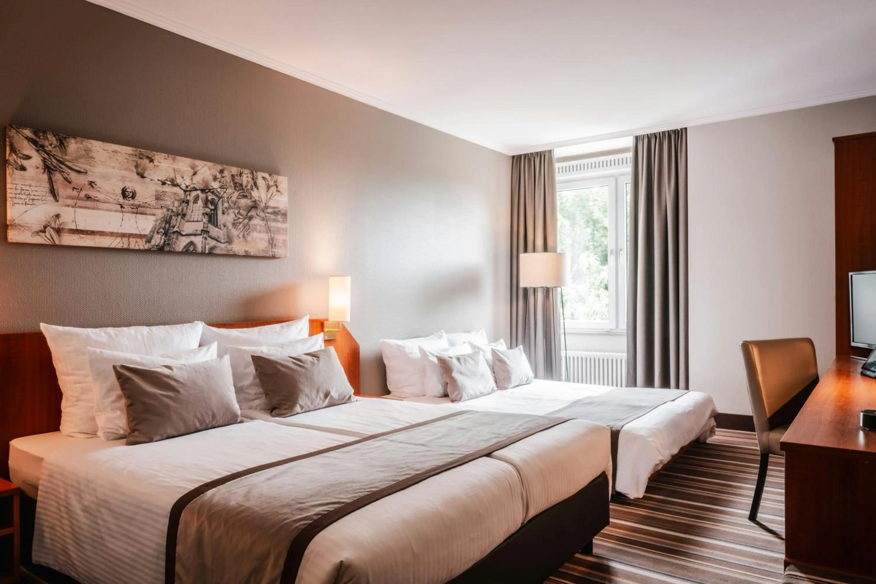 Photo of the whole room, Bed in Leonardo Hotel Aachen