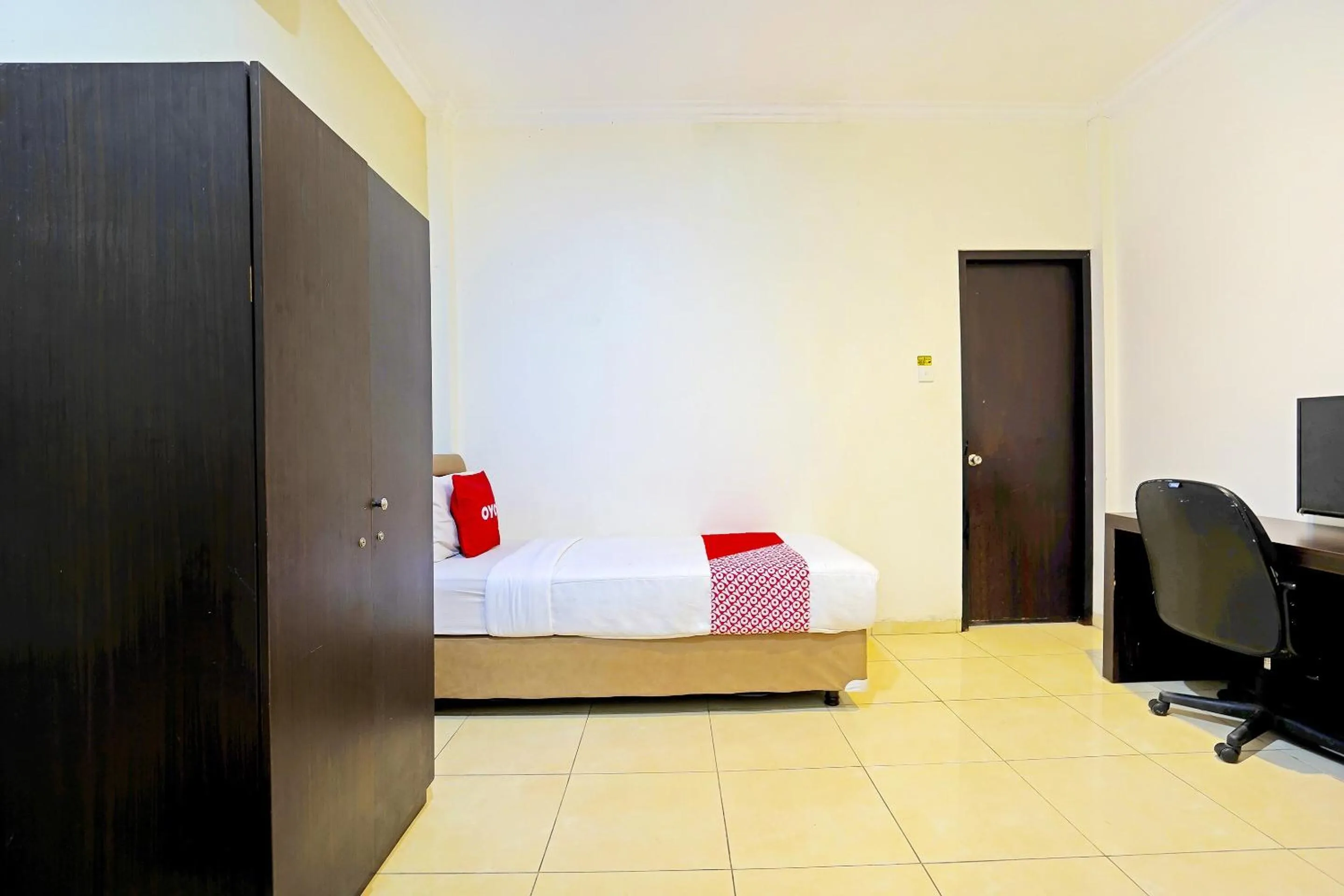 Bedroom in Hotel O Pondok Inap Shofwa 2