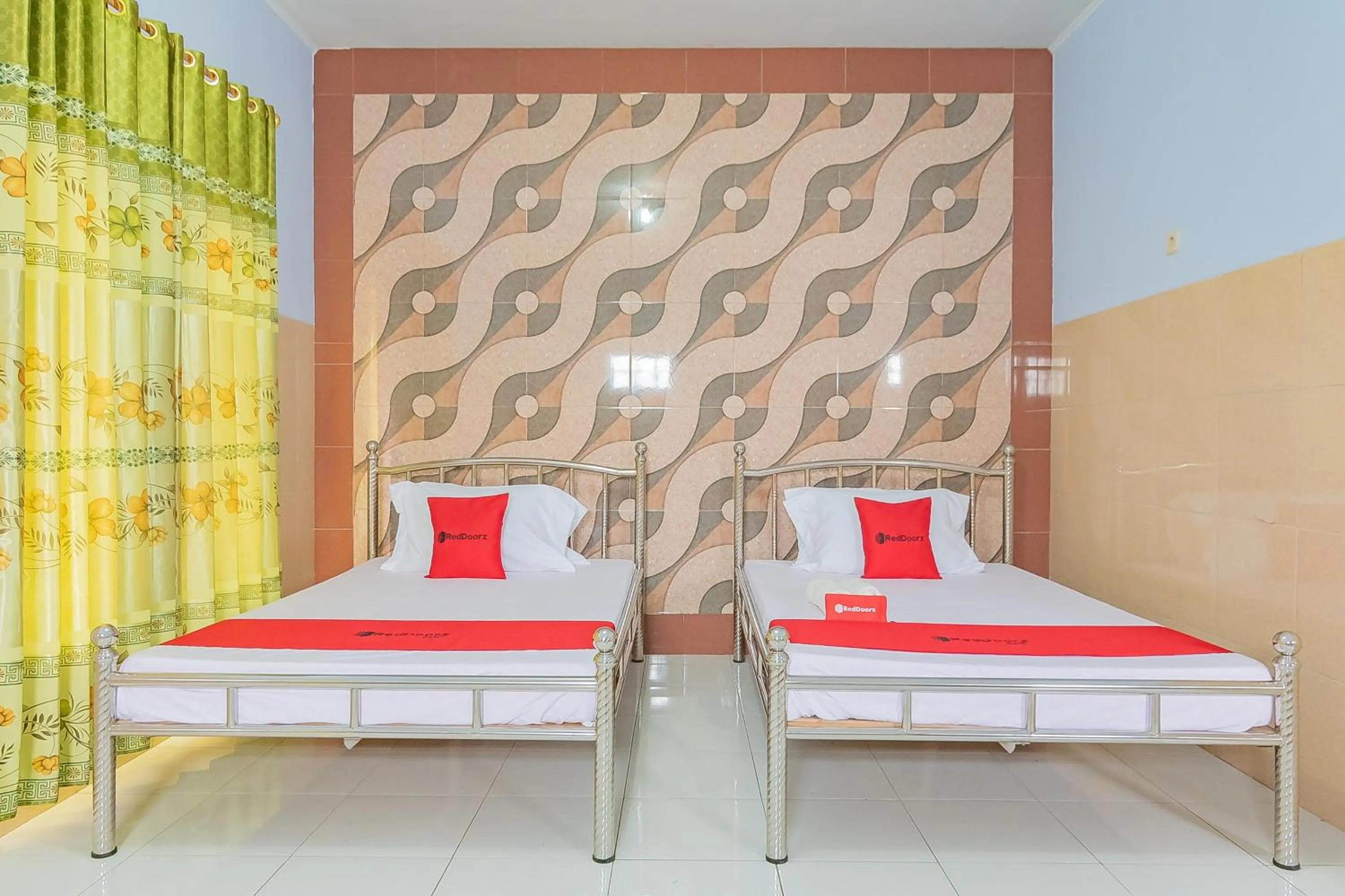 Bed in RedDoorz Syariah @ Tambak Mekar Street Subang