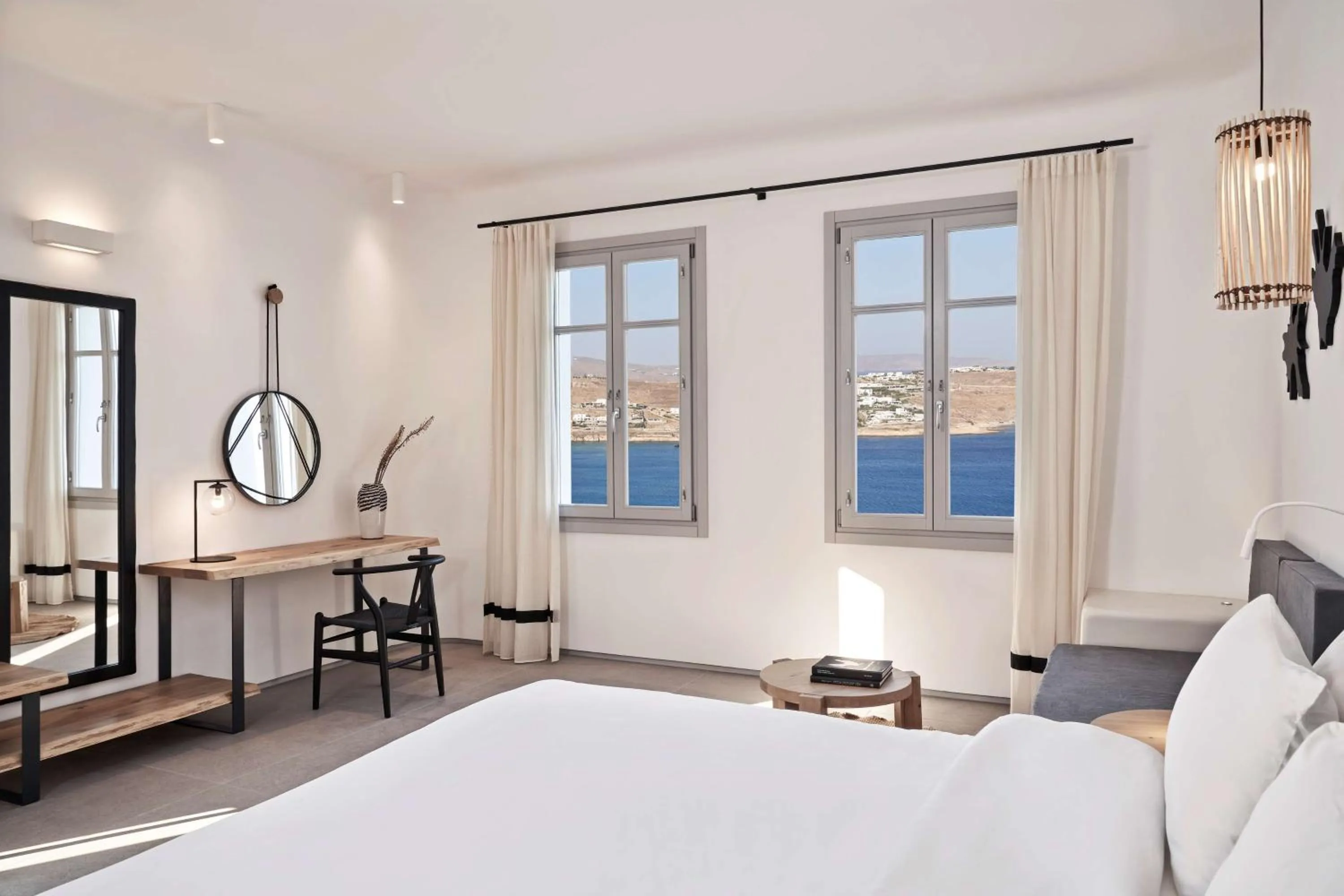 Photo of the whole room, Bed in Radisson Blu Euphoria Resort, Mykonos