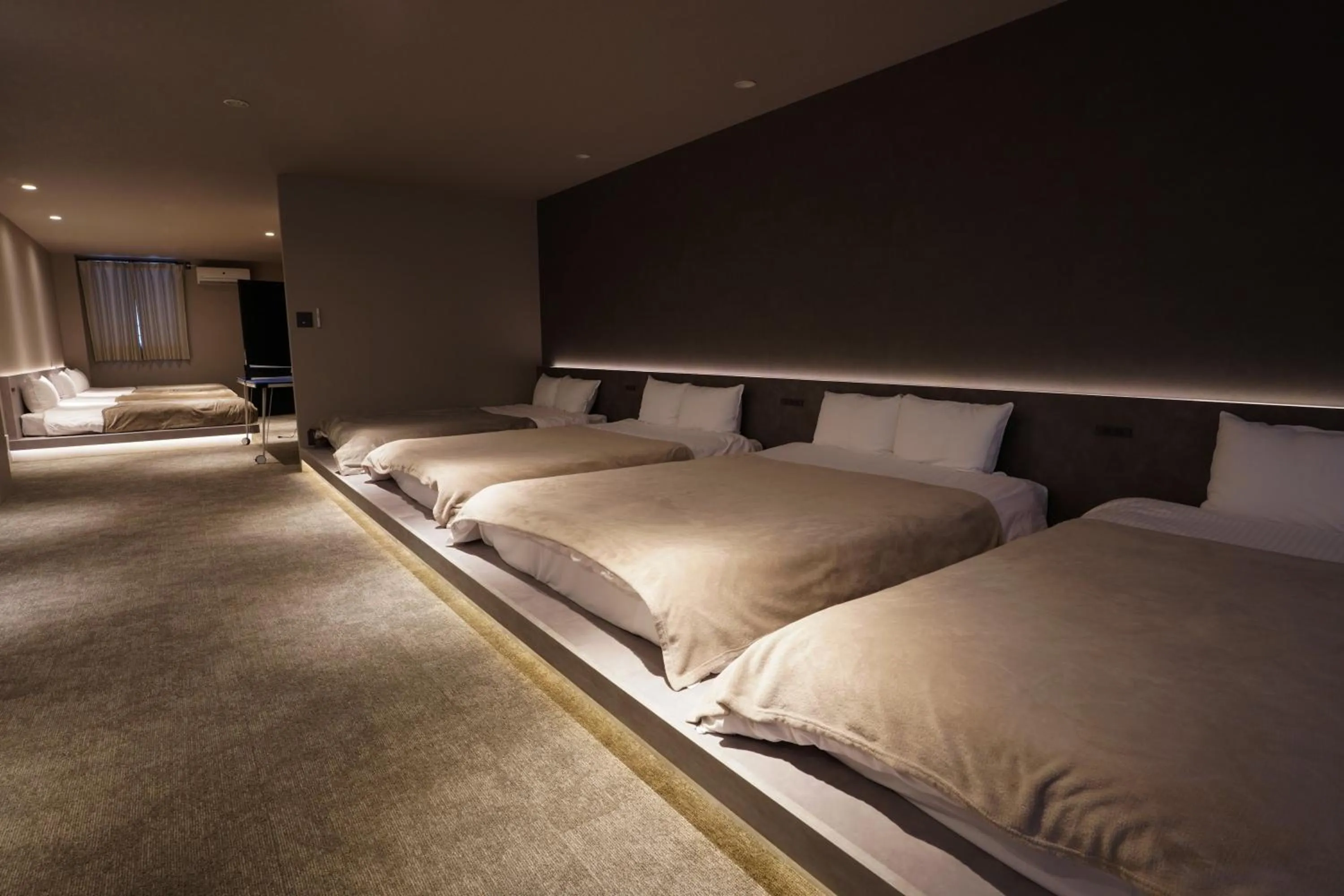 Bed in TABISAI HOTEL Luxe 博多