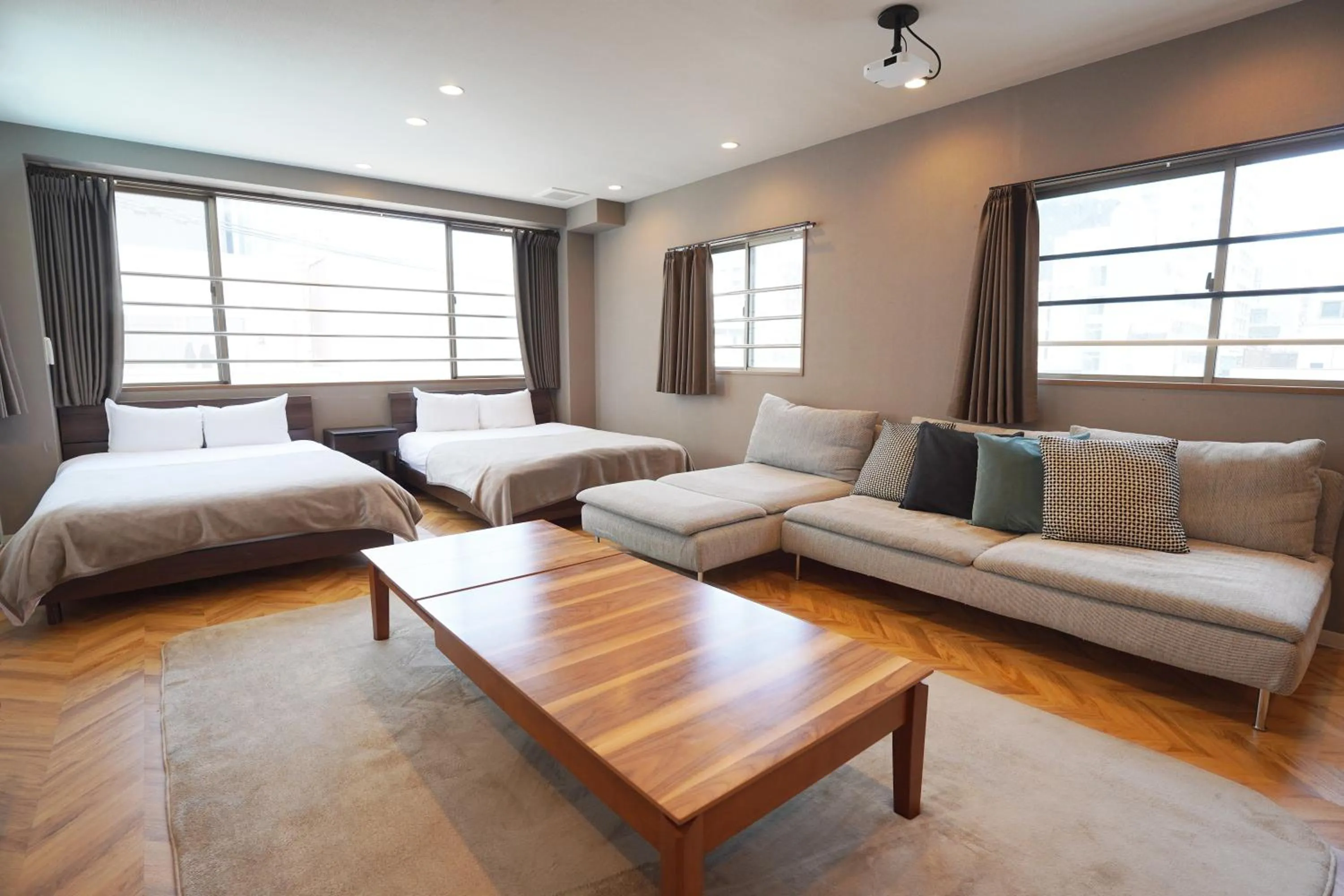 Living room, Bed in TABISAI HOTEL Premium 博多-中洲