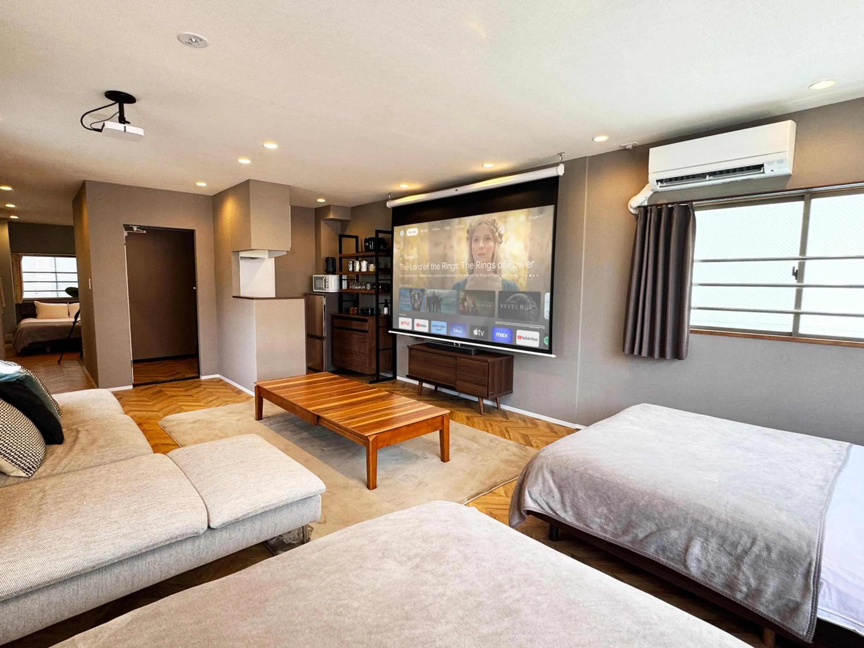 Living room, Bed in TABISAI HOTEL Premium 博多-中洲