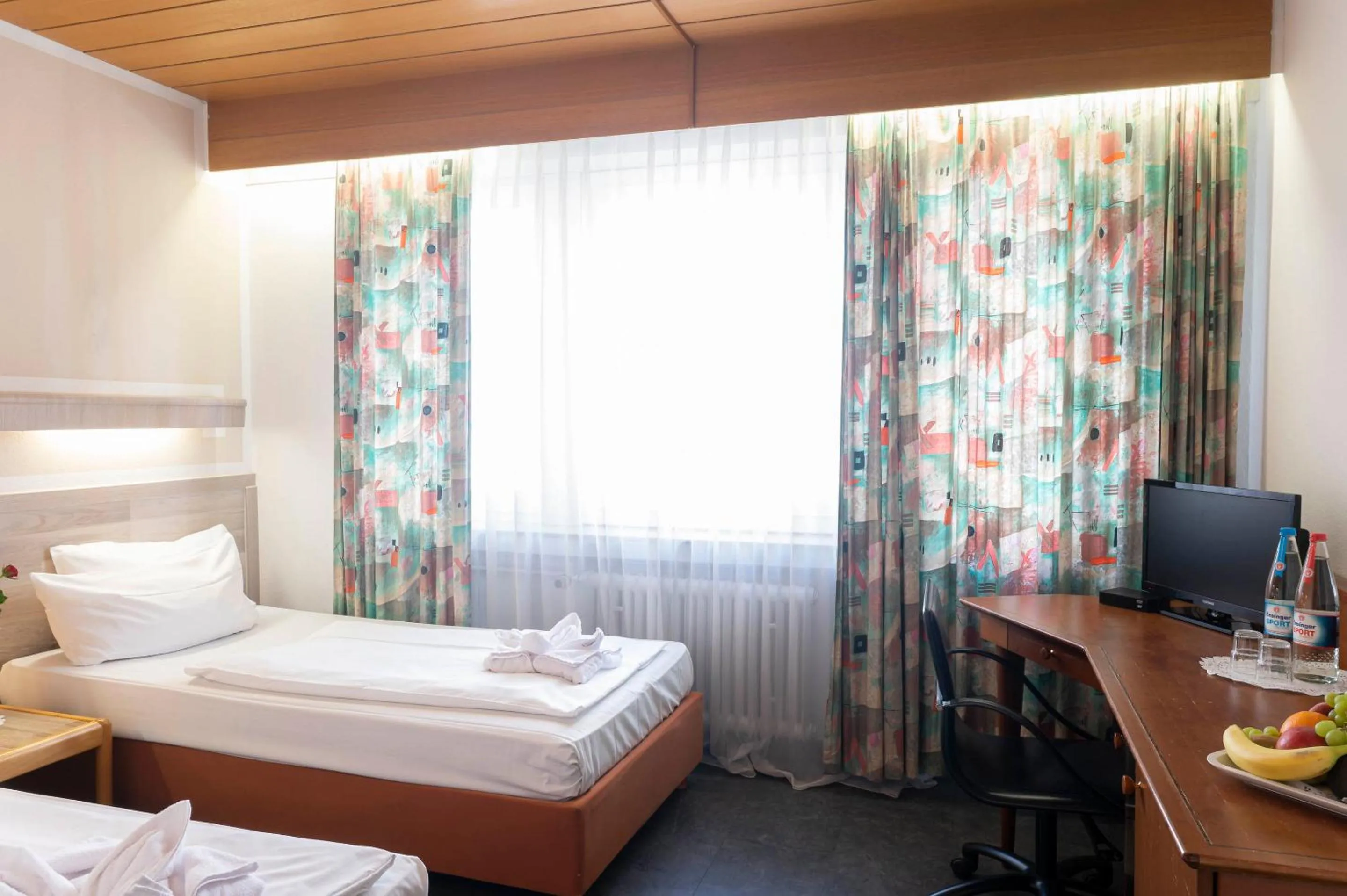 Photo of the whole room, Bed in Hotel Astoria Stuttgart City