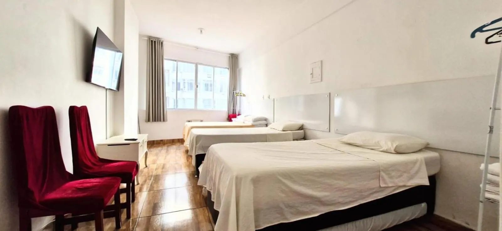 Photo of the whole room, Bed in APARTAMENTO COPACABANA saleta, quarto grande com ar cond wi-fi a 2 qds da praia