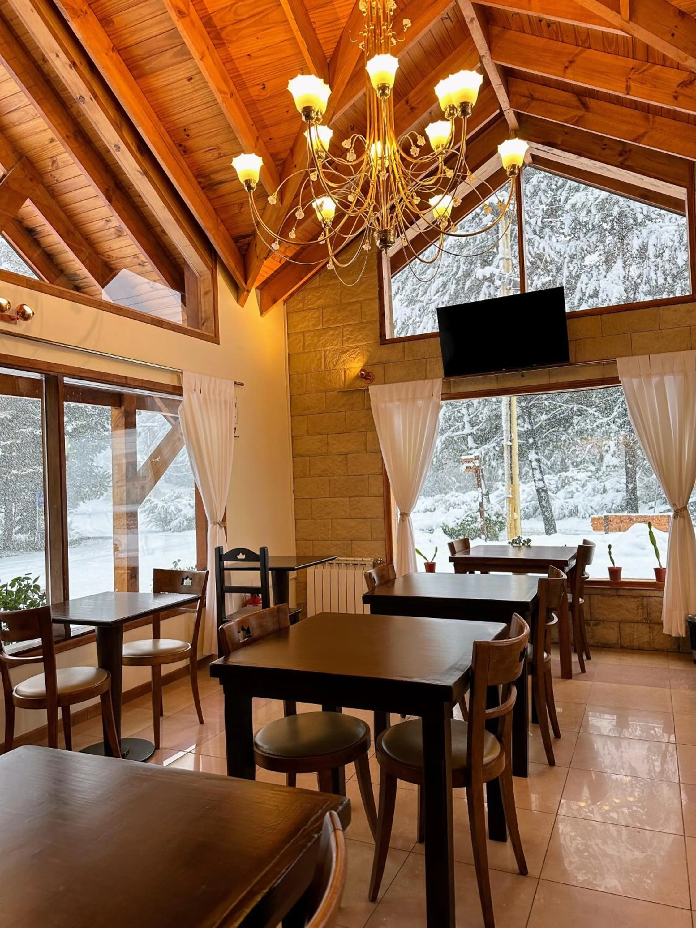 Communal lounge/ TV room in Posada del Ciprés