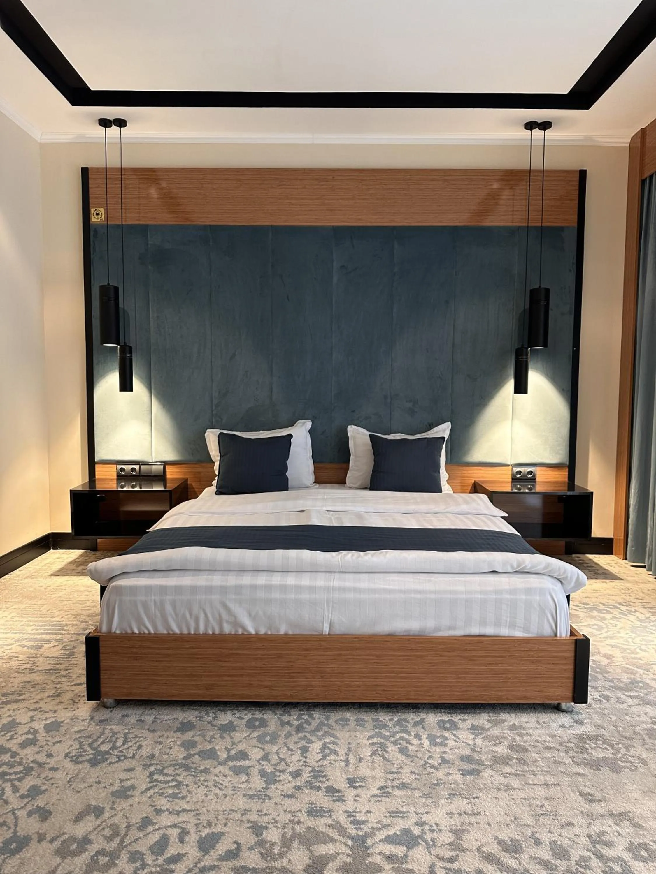 Bed in Hotel Bukhara