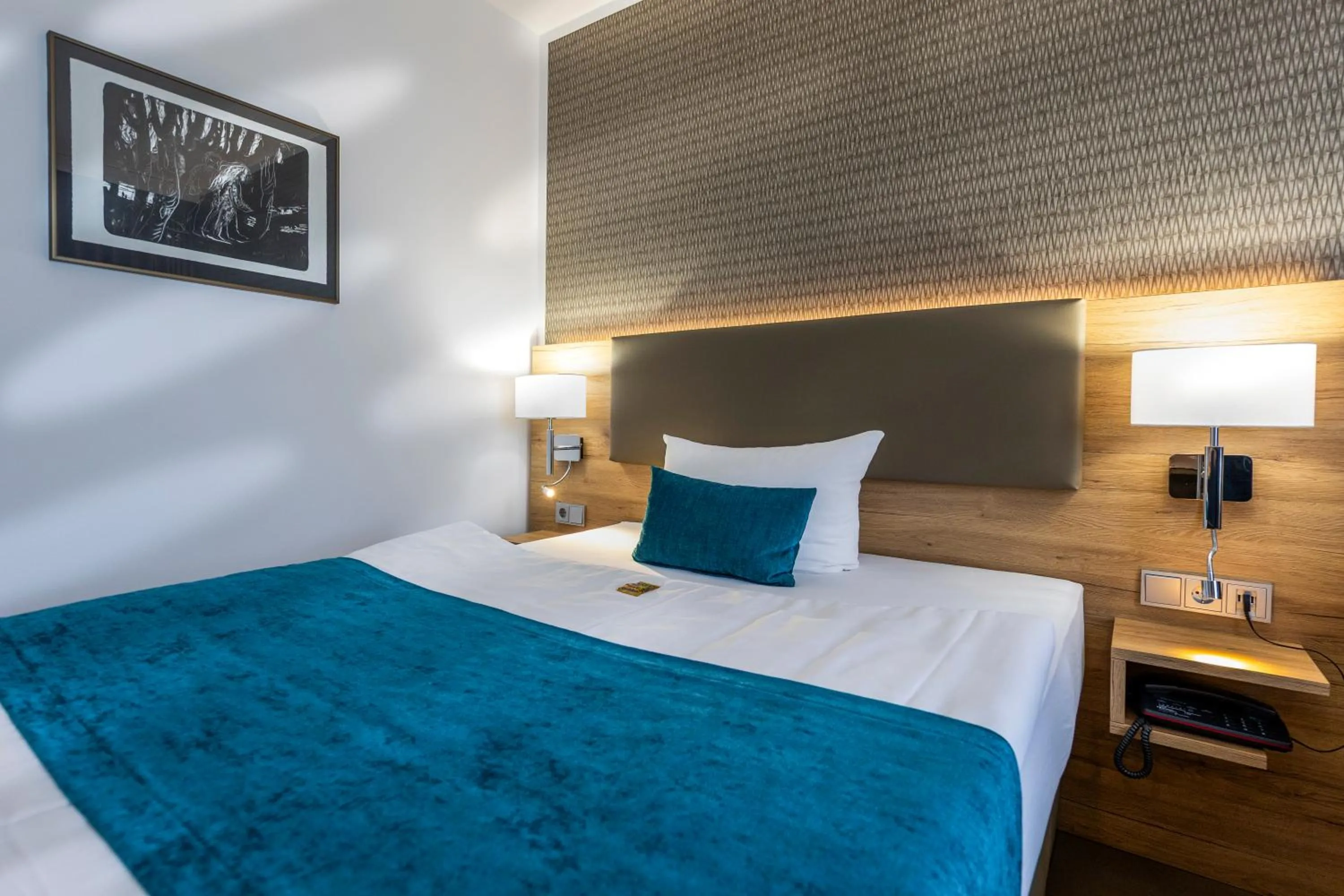 Bed in Hotel Logotel