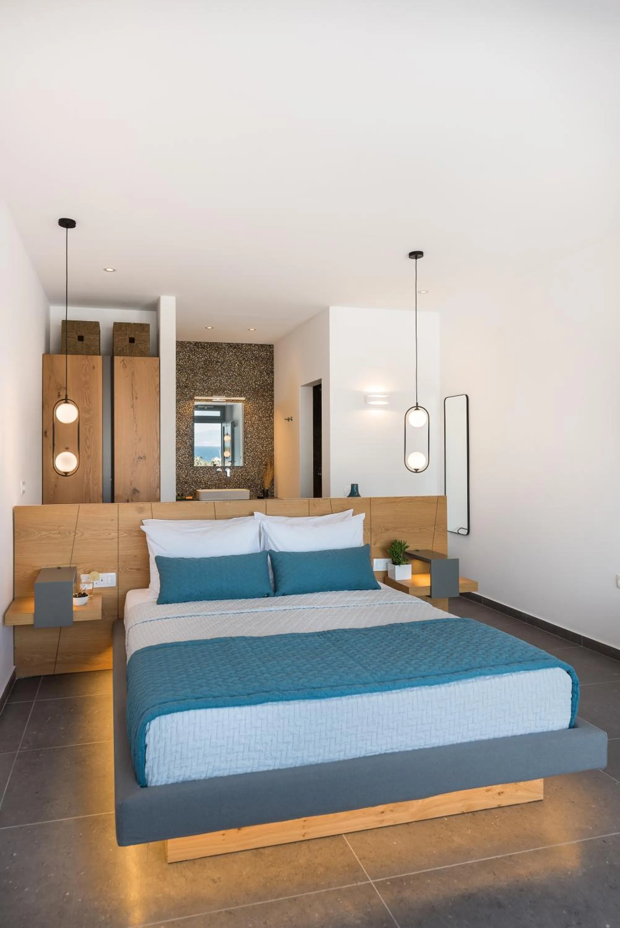 Bathroom, Bed in Volcanic Arc Suites