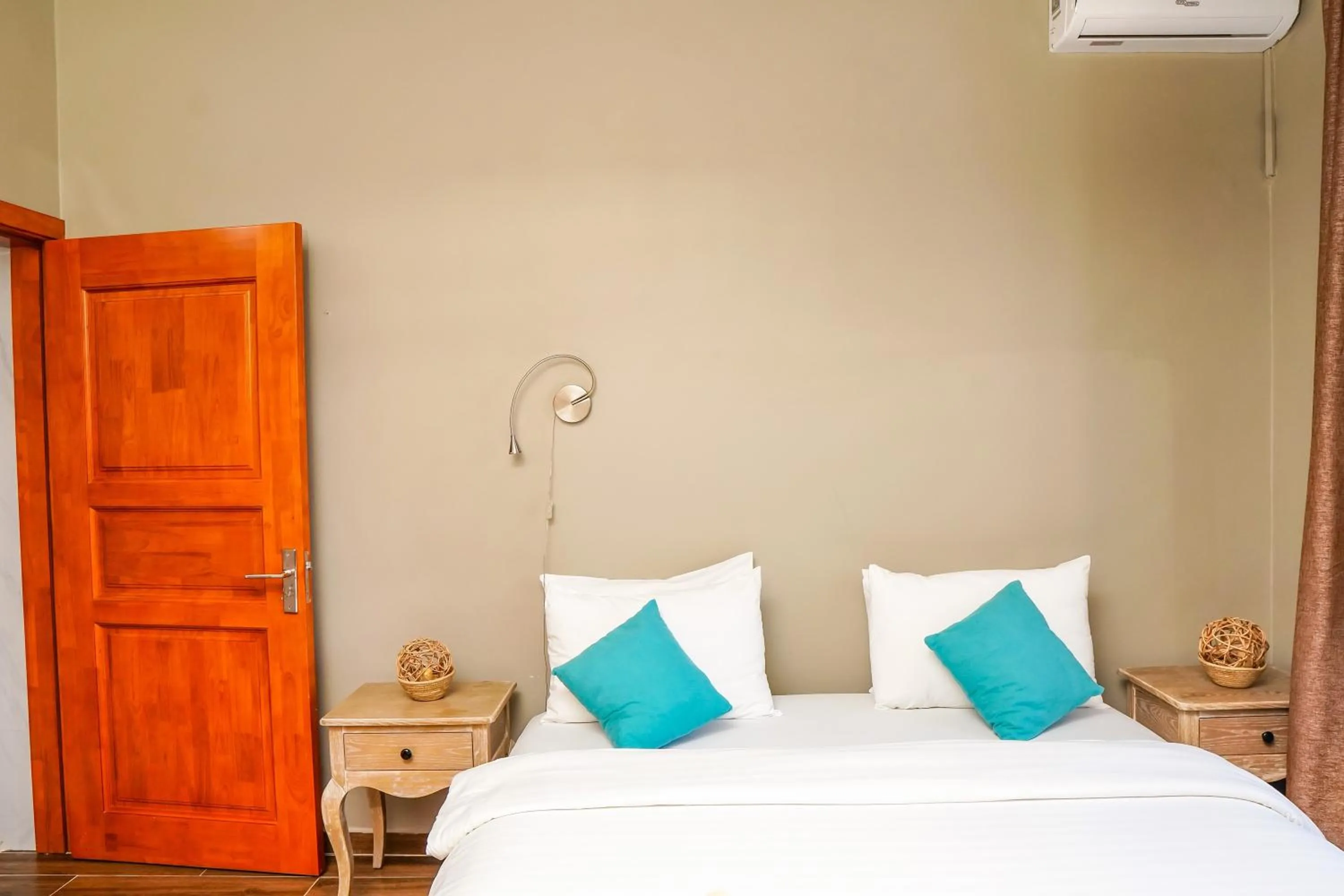 Bed in Aquamarina Hotel