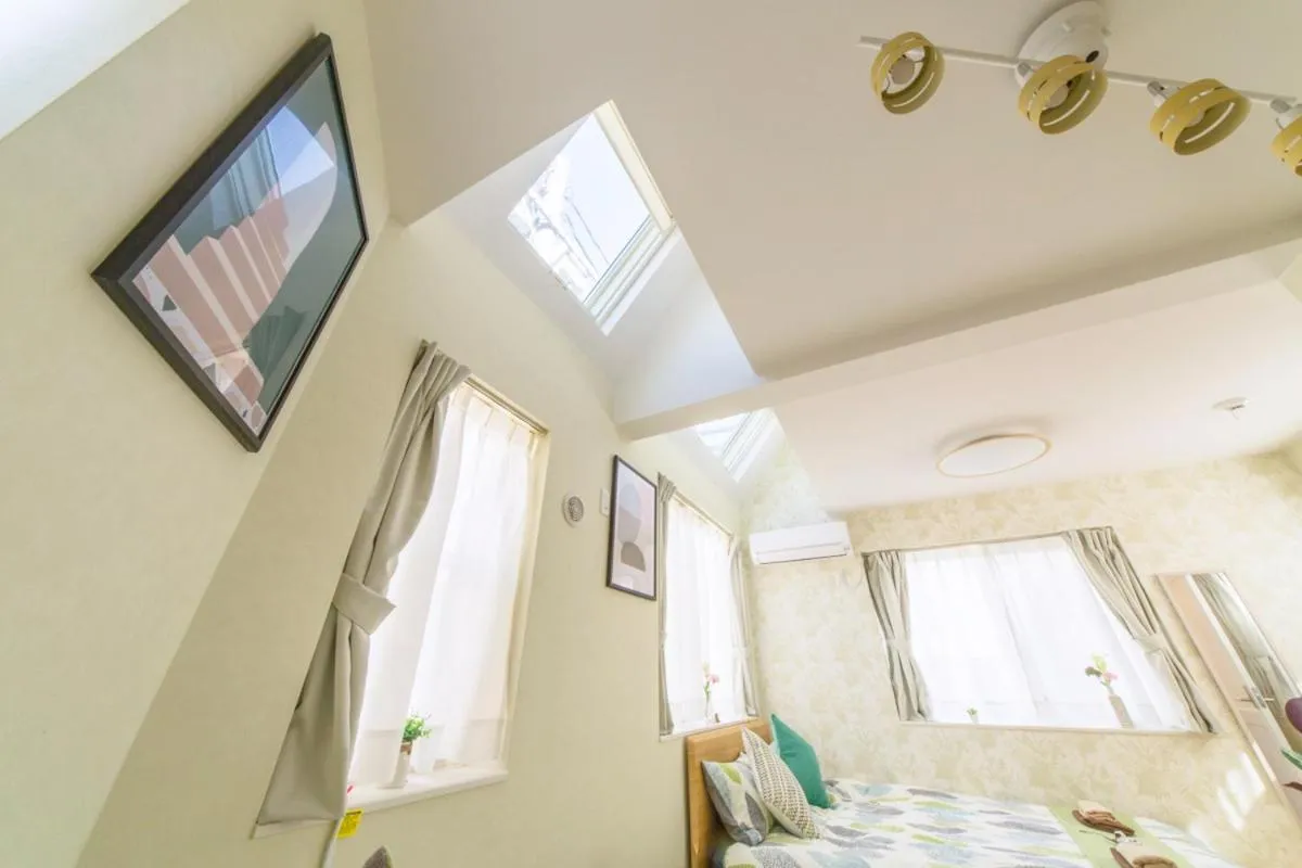 Bed in nestay villa tokyo otsuka