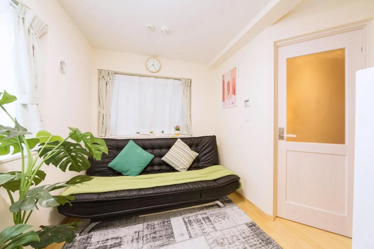 Bed in nestay villa tokyo otsuka