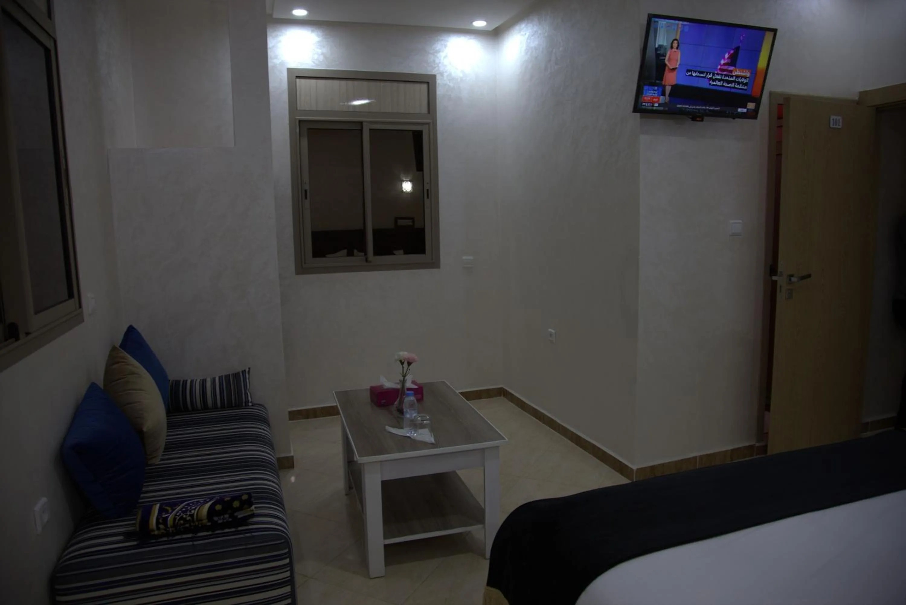 Communal lounge/ TV room, Bed in Dakhla Guest