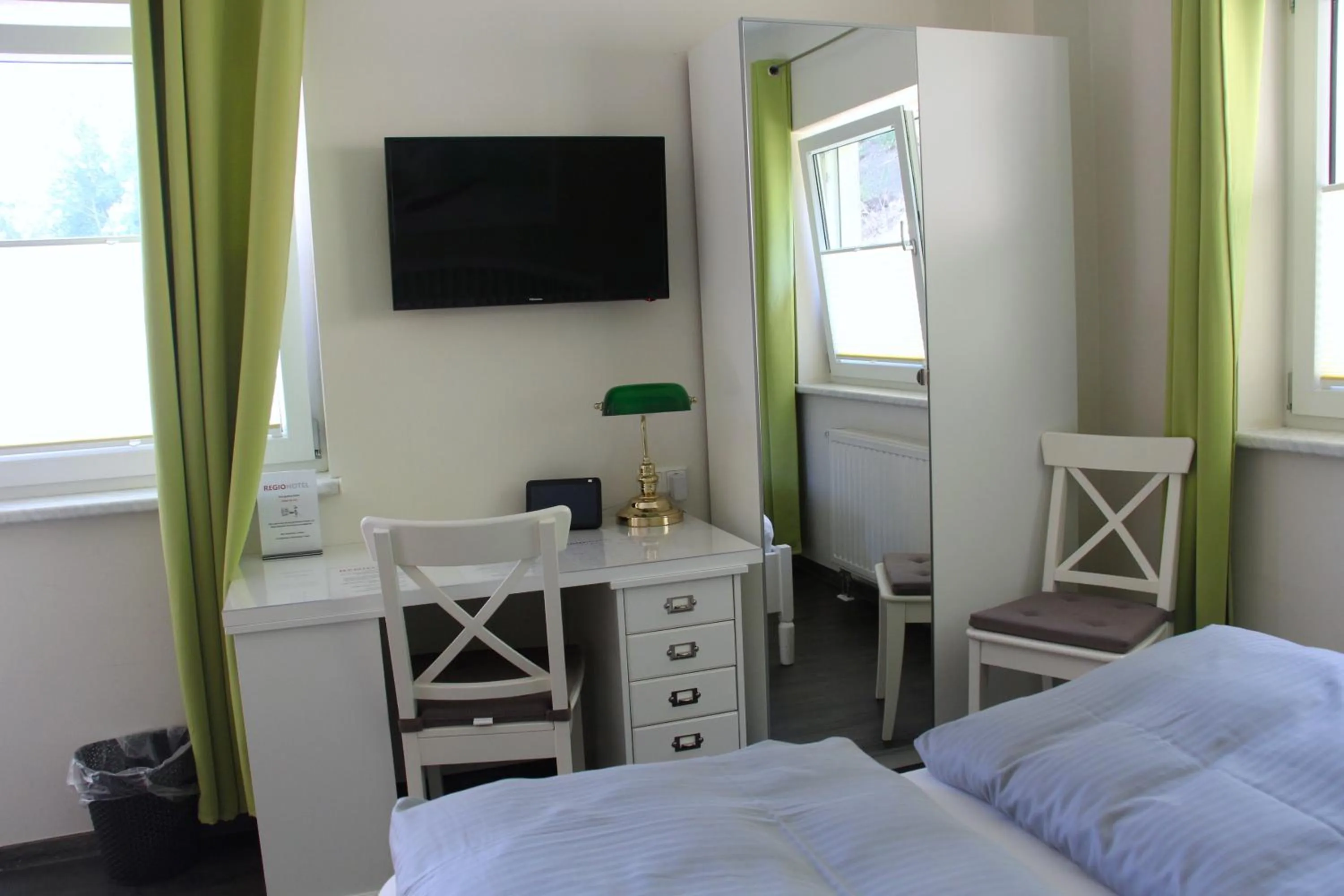 Photo of the whole room, Bed in REGIOHOTEL Schanzenhaus Wernigerode