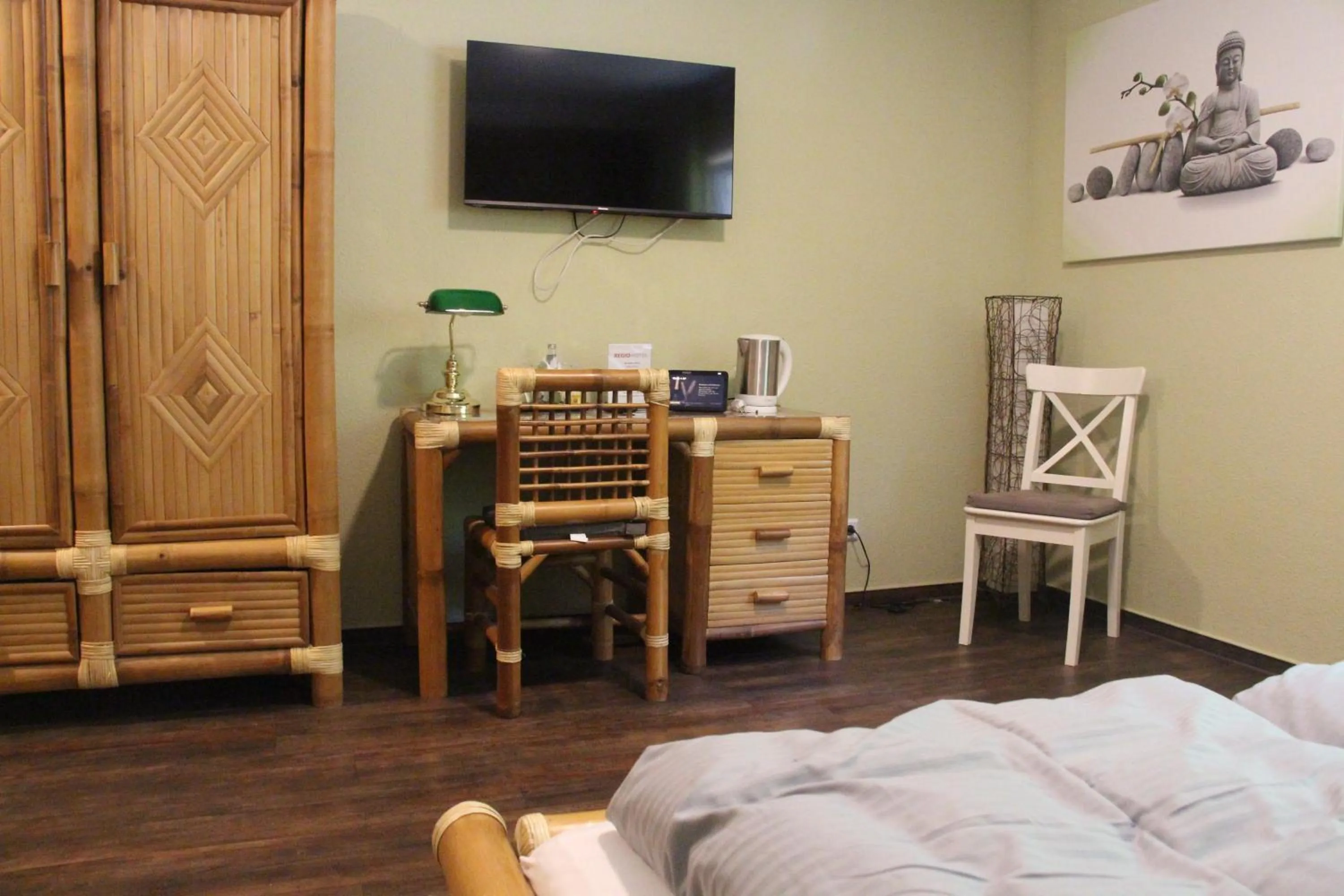 Photo of the whole room, Bed in REGIOHOTEL Schanzenhaus Wernigerode