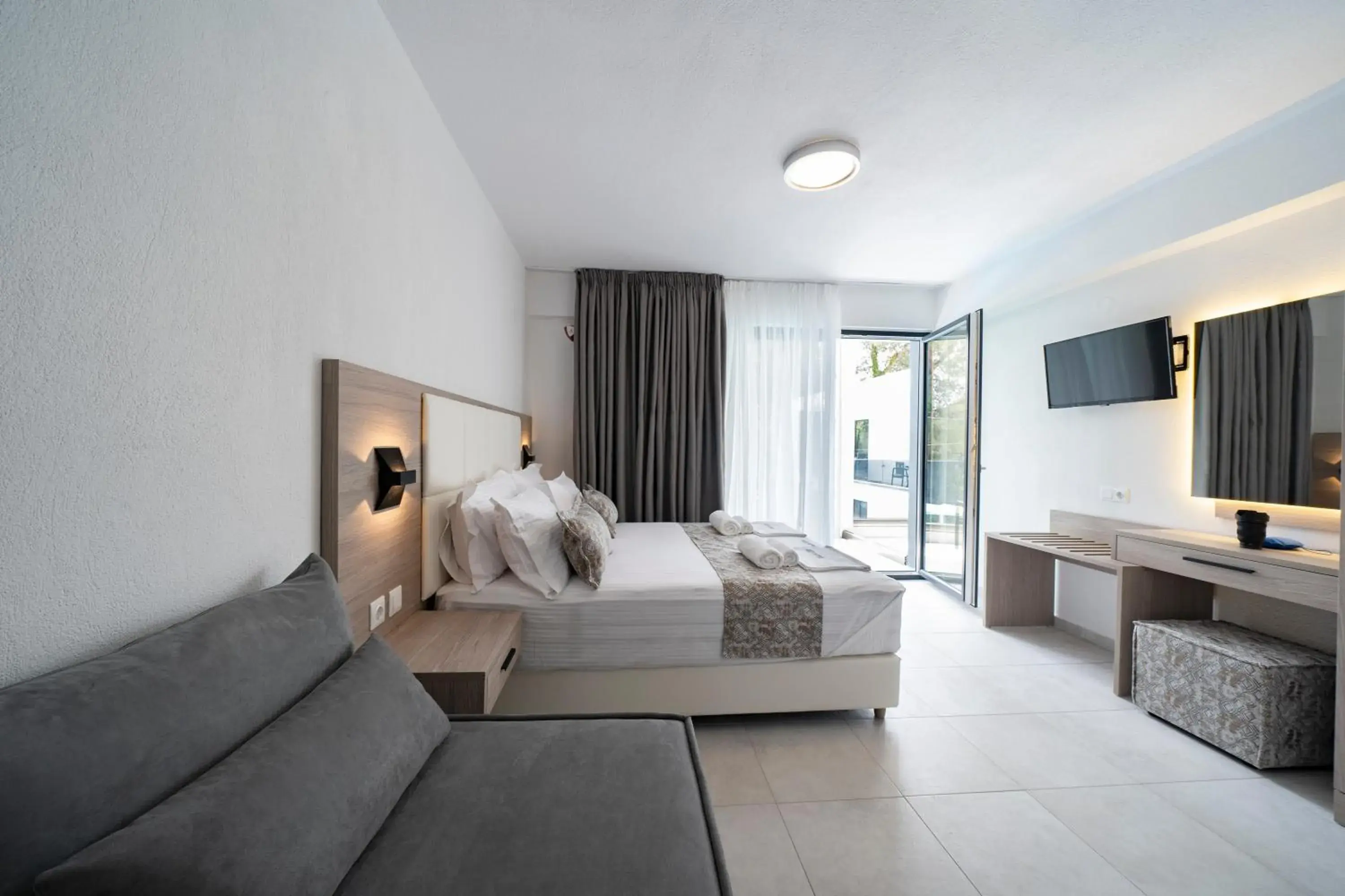 Deluxe Triple Room in Avaton Luxury Resort and Spa Access the Enigma - Adults Only & Kids 14 Plus- Deluxe Triple Room in Avaton Luxury Resort and Spa Access the Enigma - Adults Only & Kids 14 Plus-