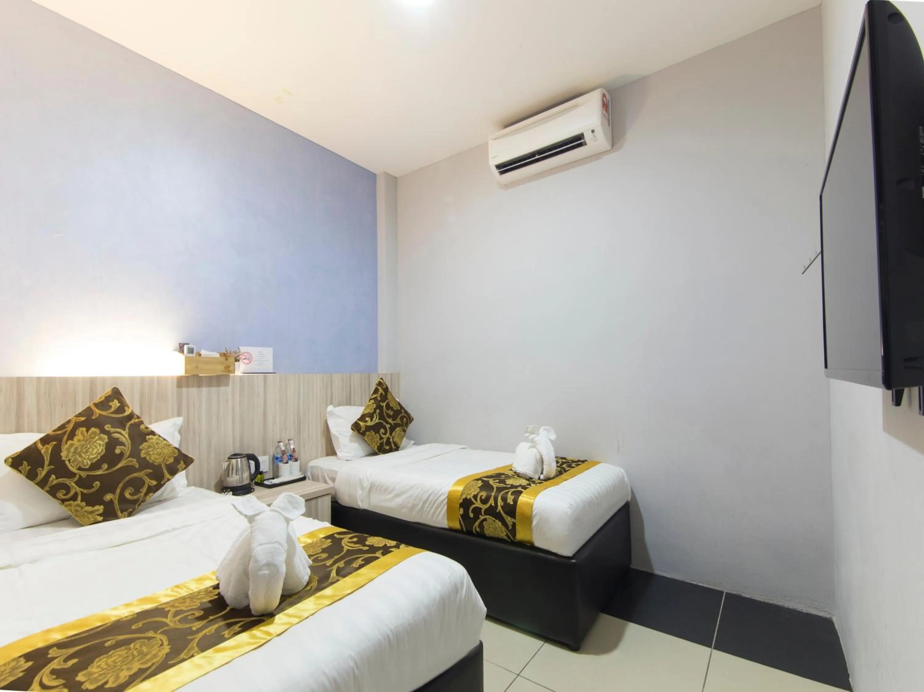 Bed in Top Garden Hotel