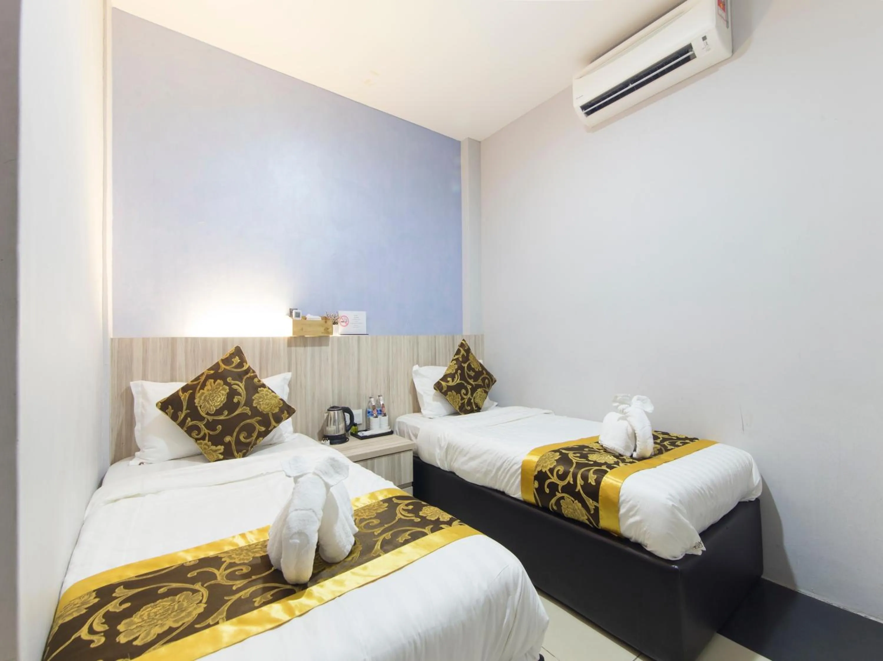 Bed in Top Garden Hotel