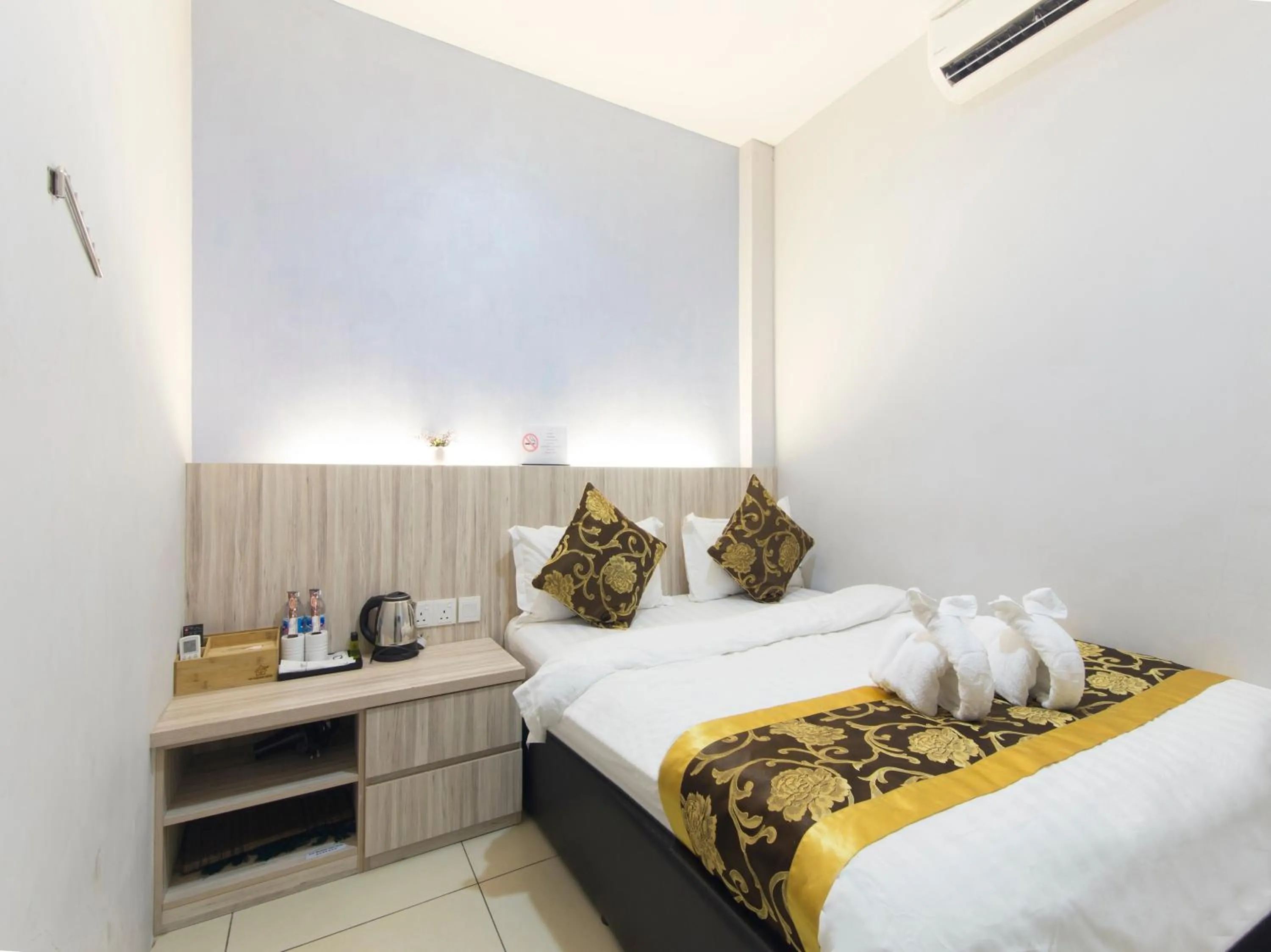 Bed in Top Garden Hotel