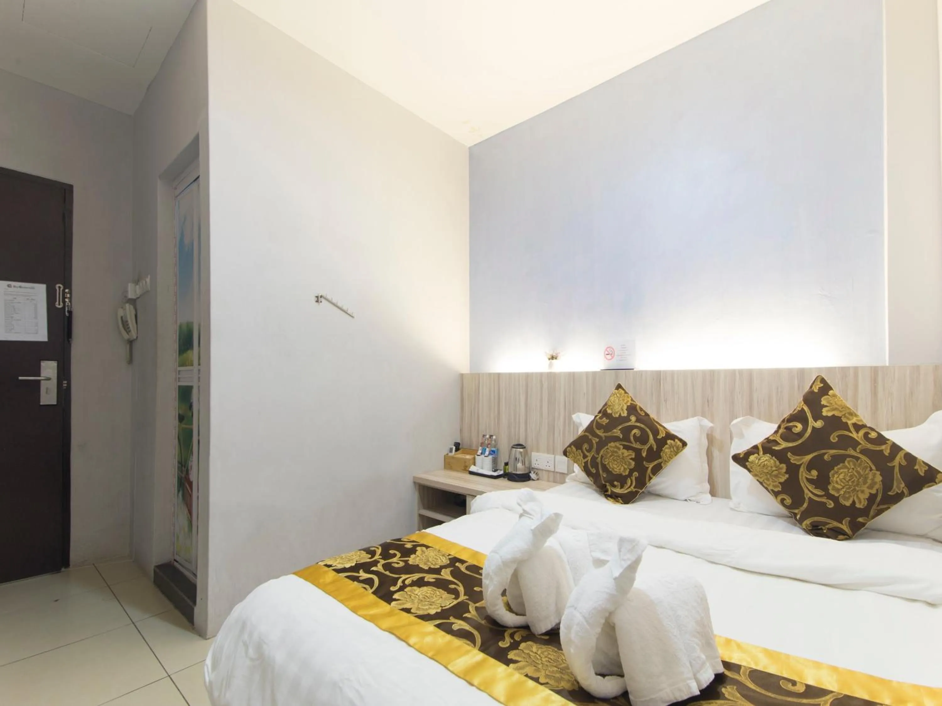 Bed in Top Garden Hotel