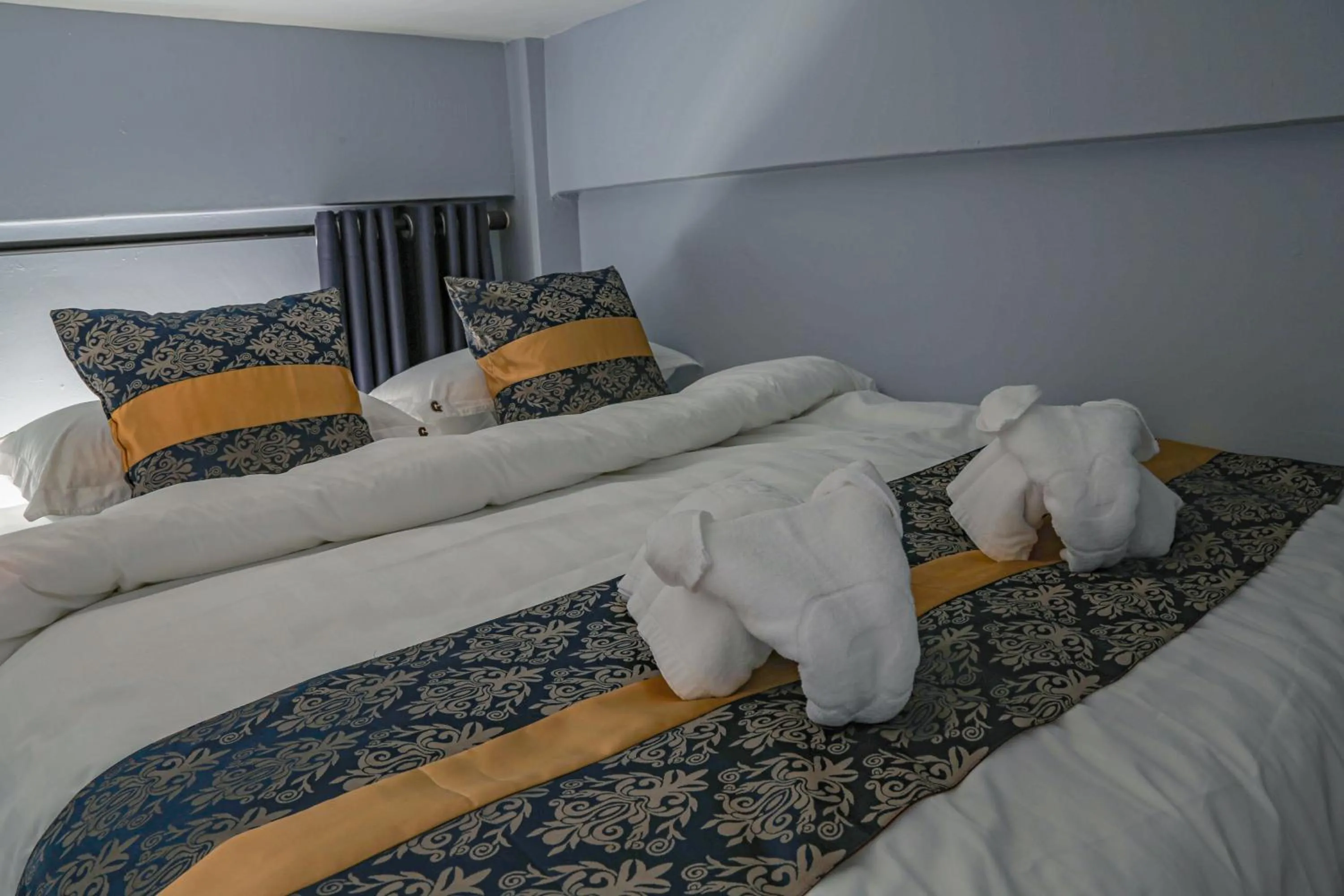 Bed in Top Garden Hotel