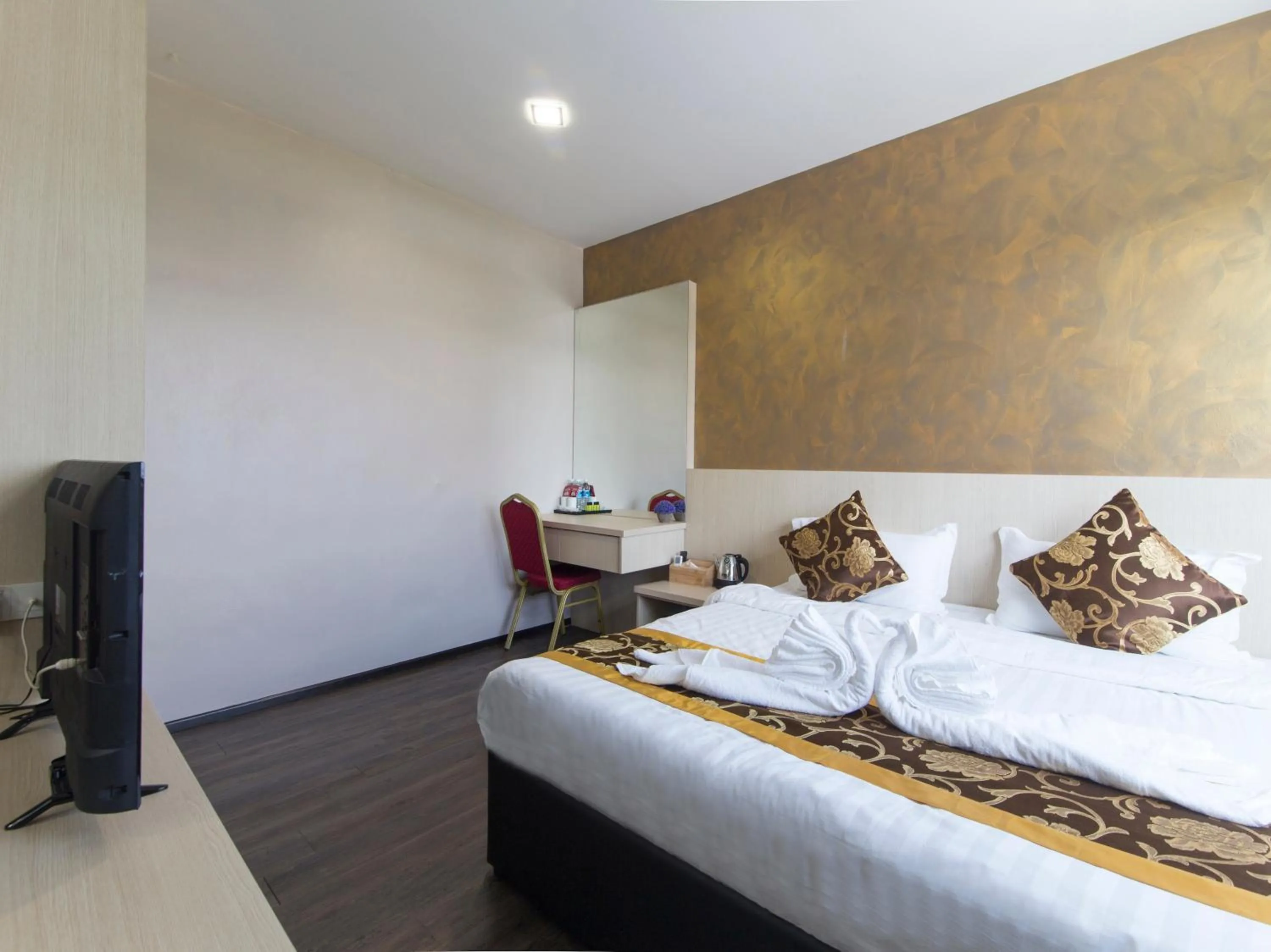 Bed in Top Garden Hotel