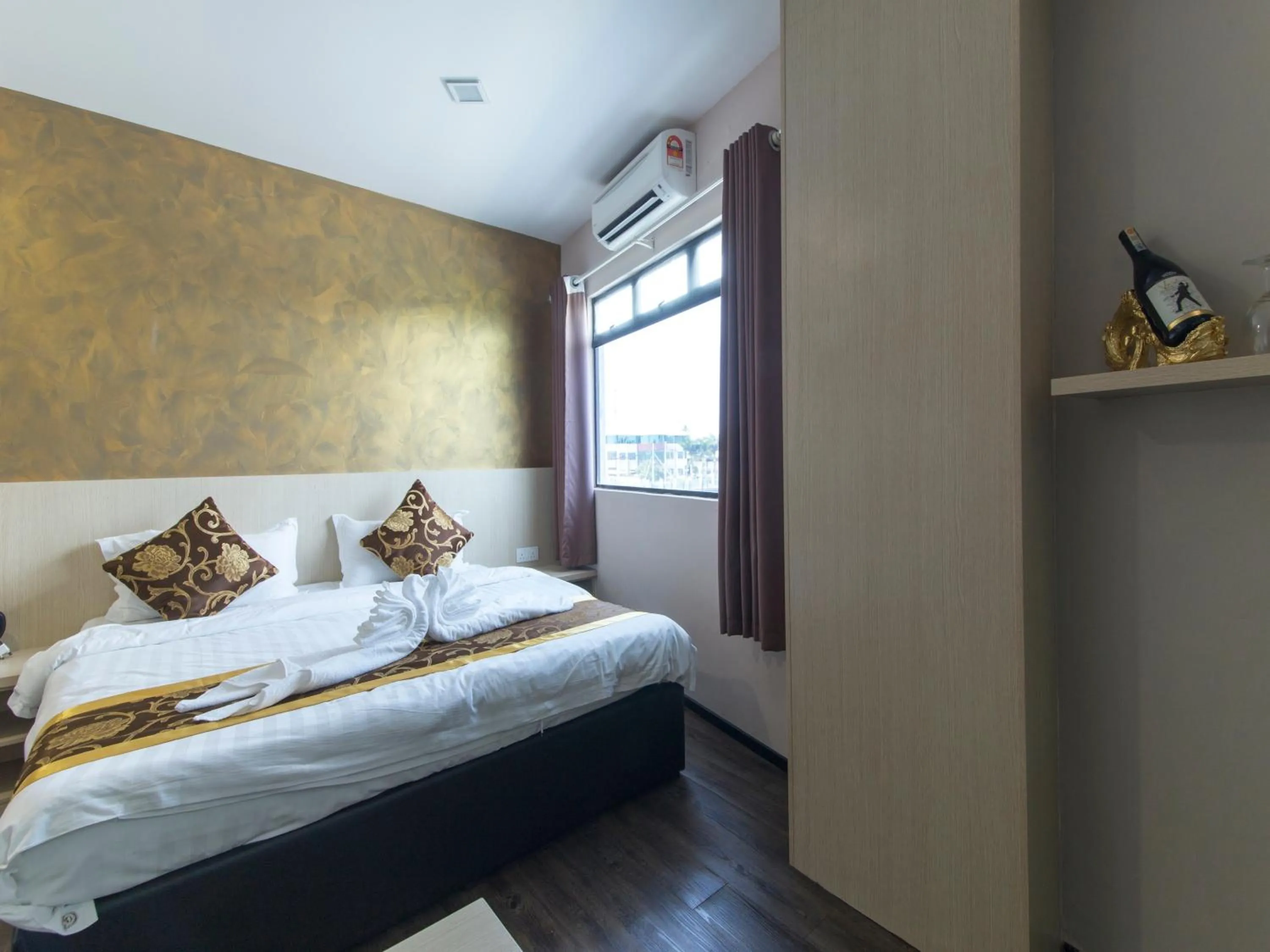 Bed in Top Garden Hotel