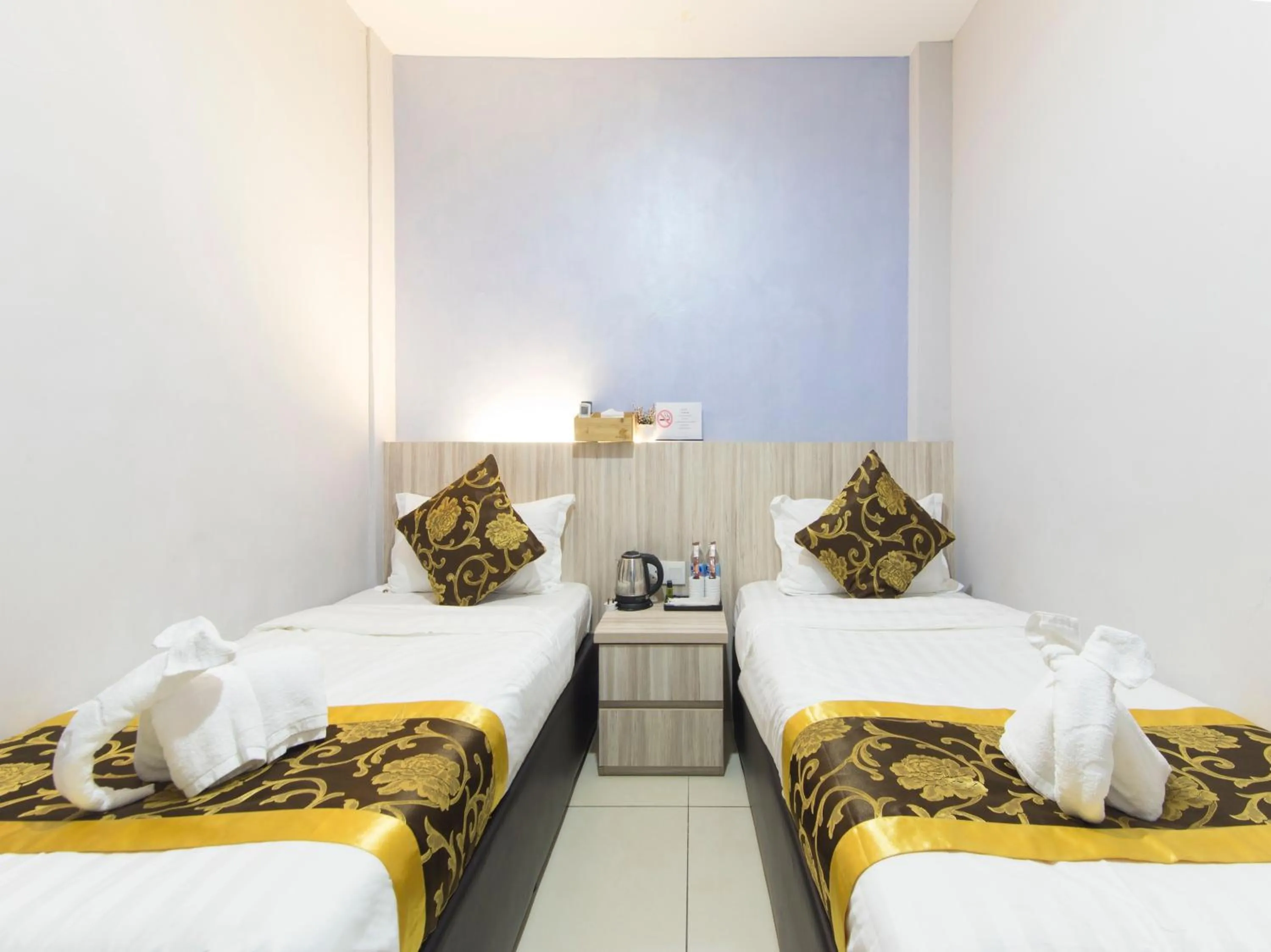 Bed in Top Garden Hotel