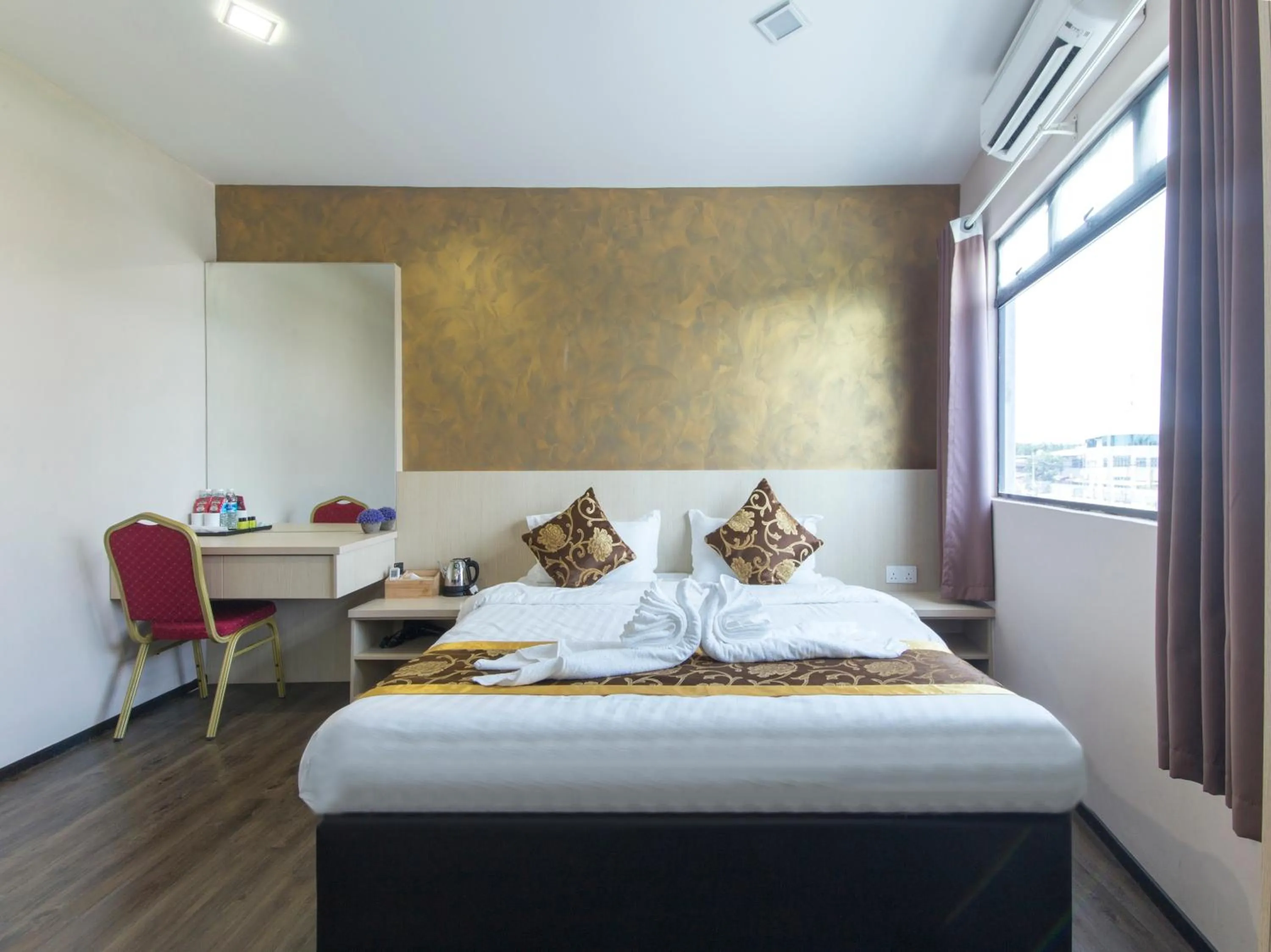 Bed in Top Garden Hotel