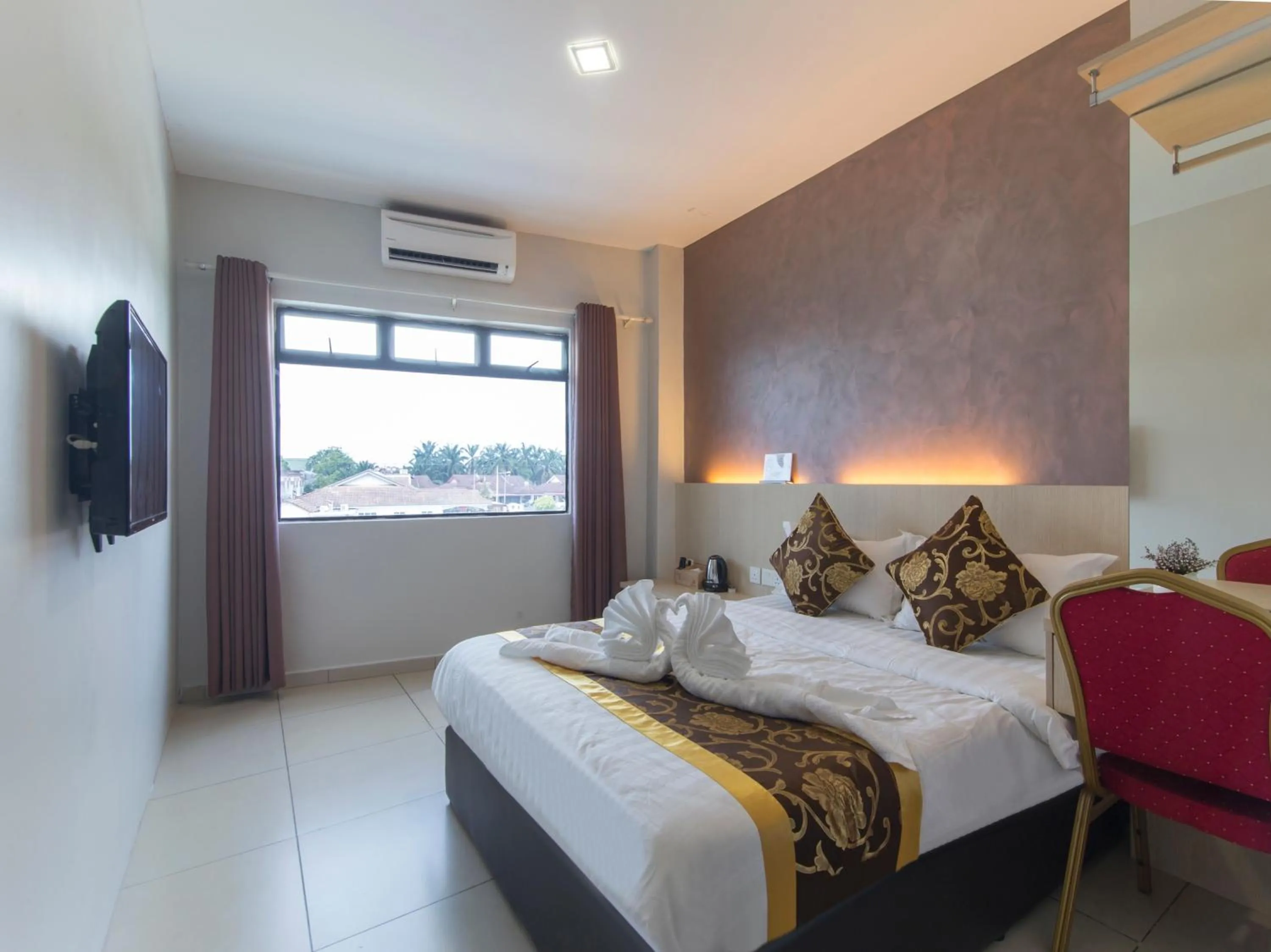 Bed in Top Garden Hotel